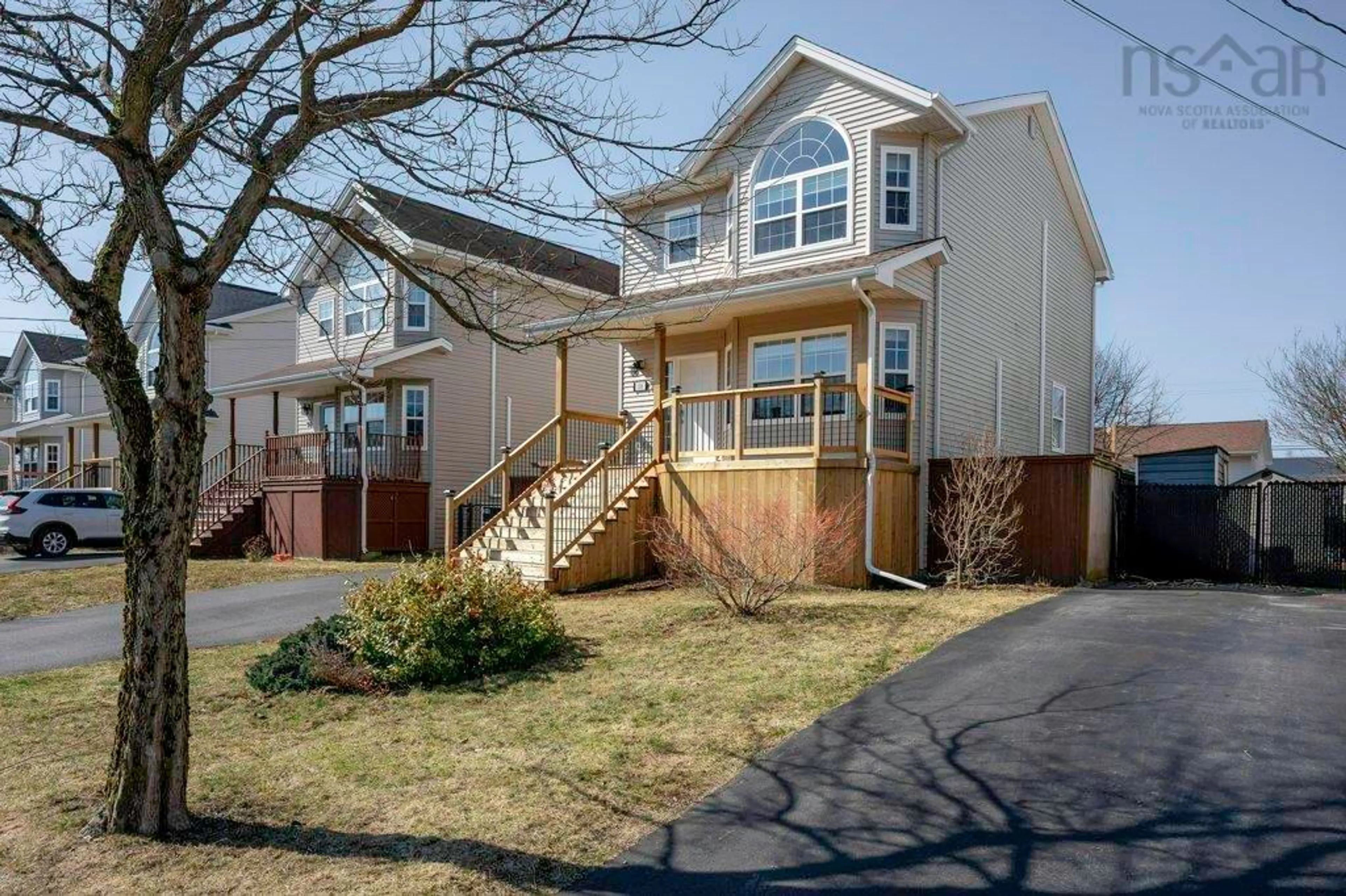 Home with vinyl exterior material, street for 100 Atikian Dr, Eastern Passage Nova Scotia B3G 0A9