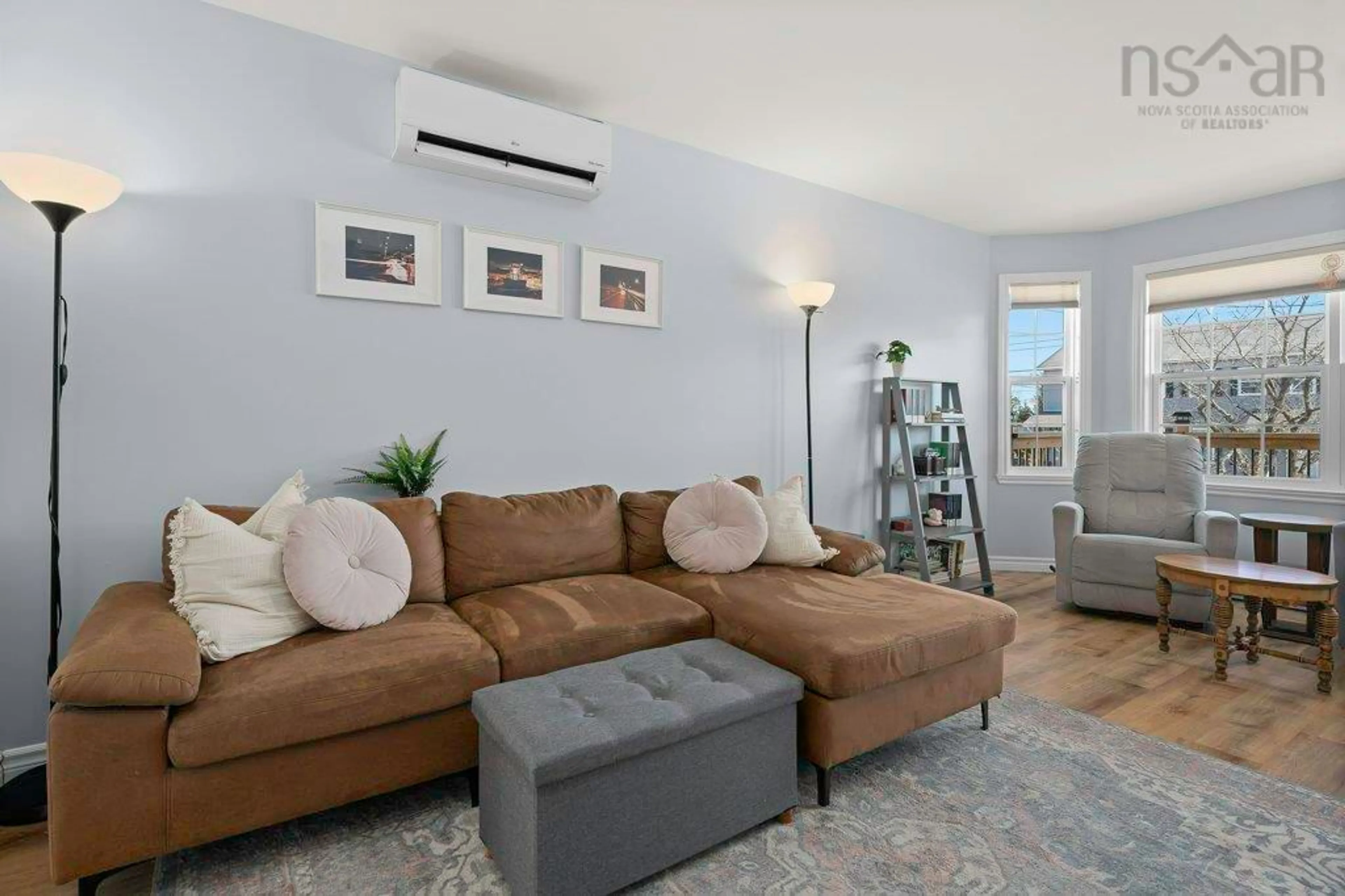 Living room with furniture, wood/laminate floor for 100 Atikian Dr, Eastern Passage Nova Scotia B3G 0A9