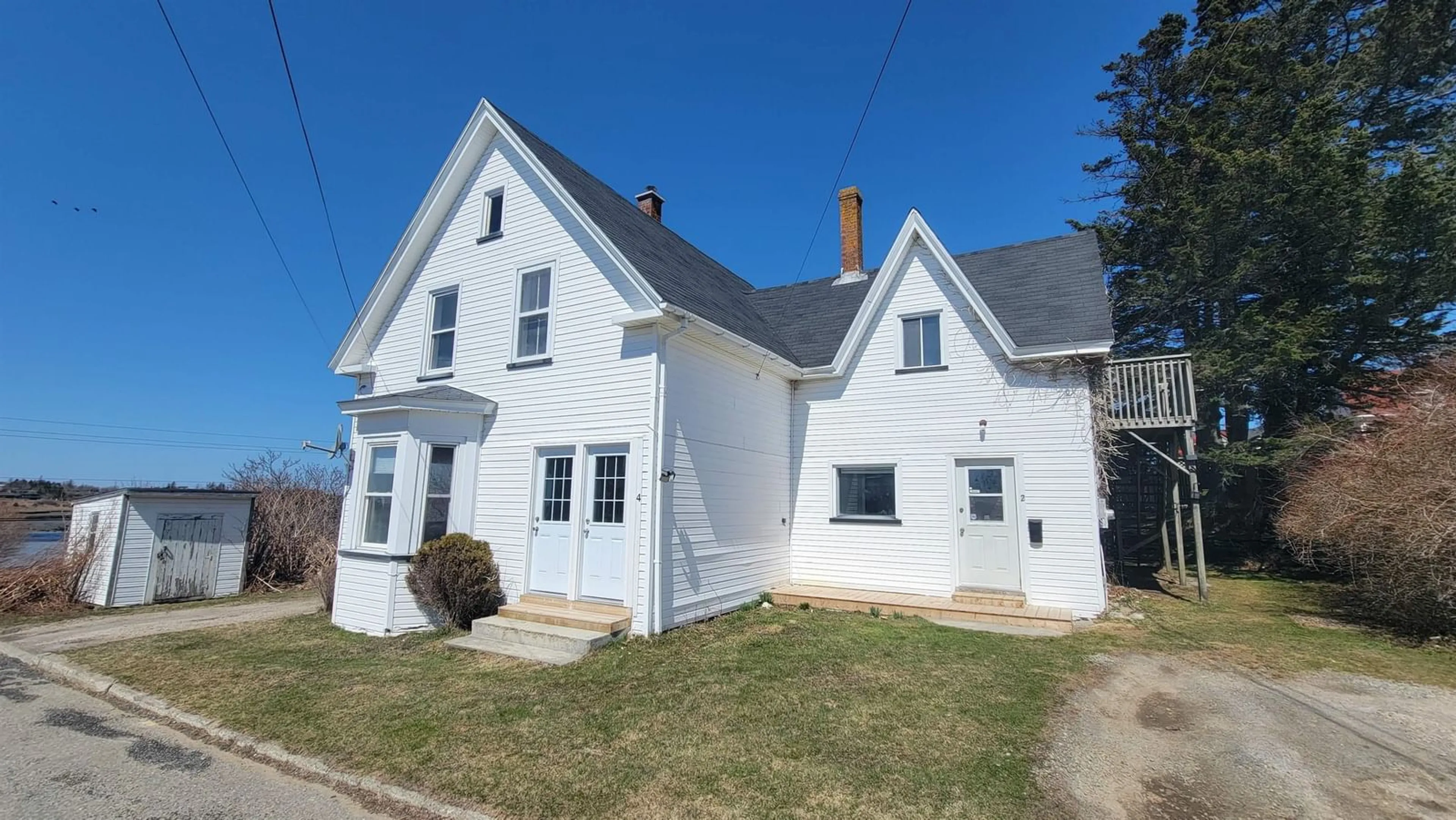 A pic from outside/outdoor area/front of a property/back of a property/a pic from drone, building for 2-4 Baker St, Yarmouth Nova Scotia B5A 2W7