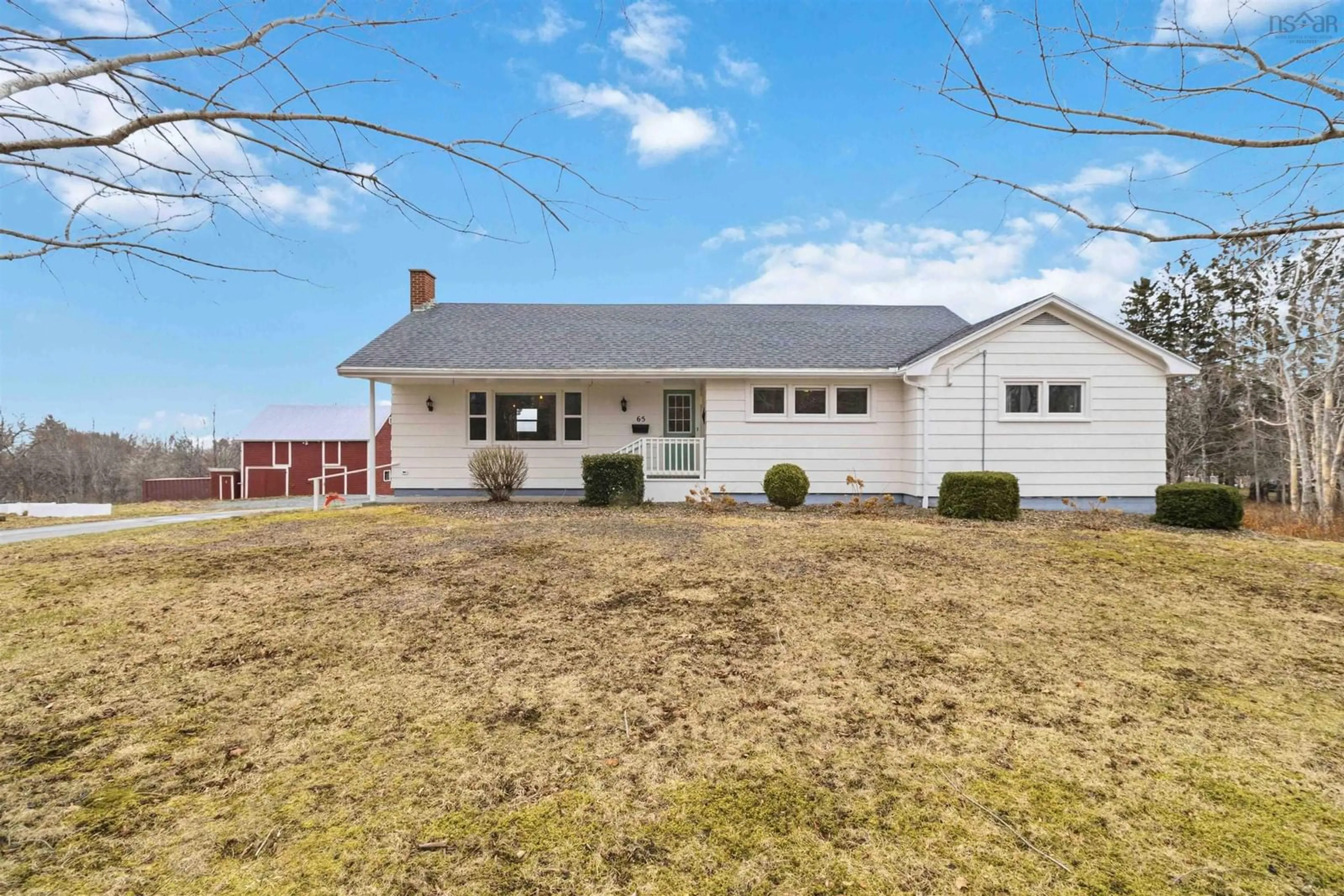 Home with vinyl exterior material, street for 65 Back Rd, Broad Cove Nova Scotia B0J 2H0