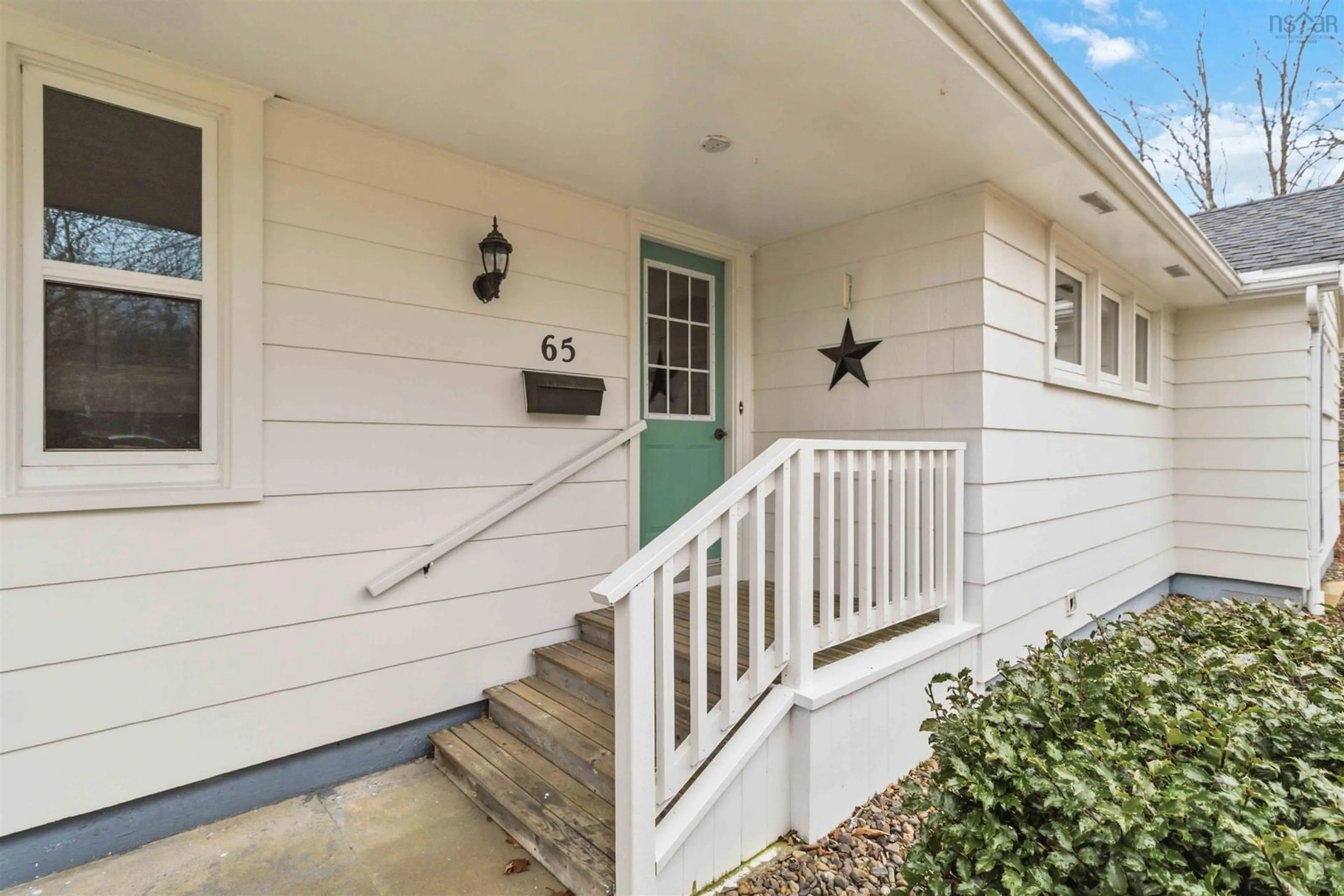 Home with vinyl exterior material, street for 65 Back Rd, Broad Cove Nova Scotia B0J 2H0