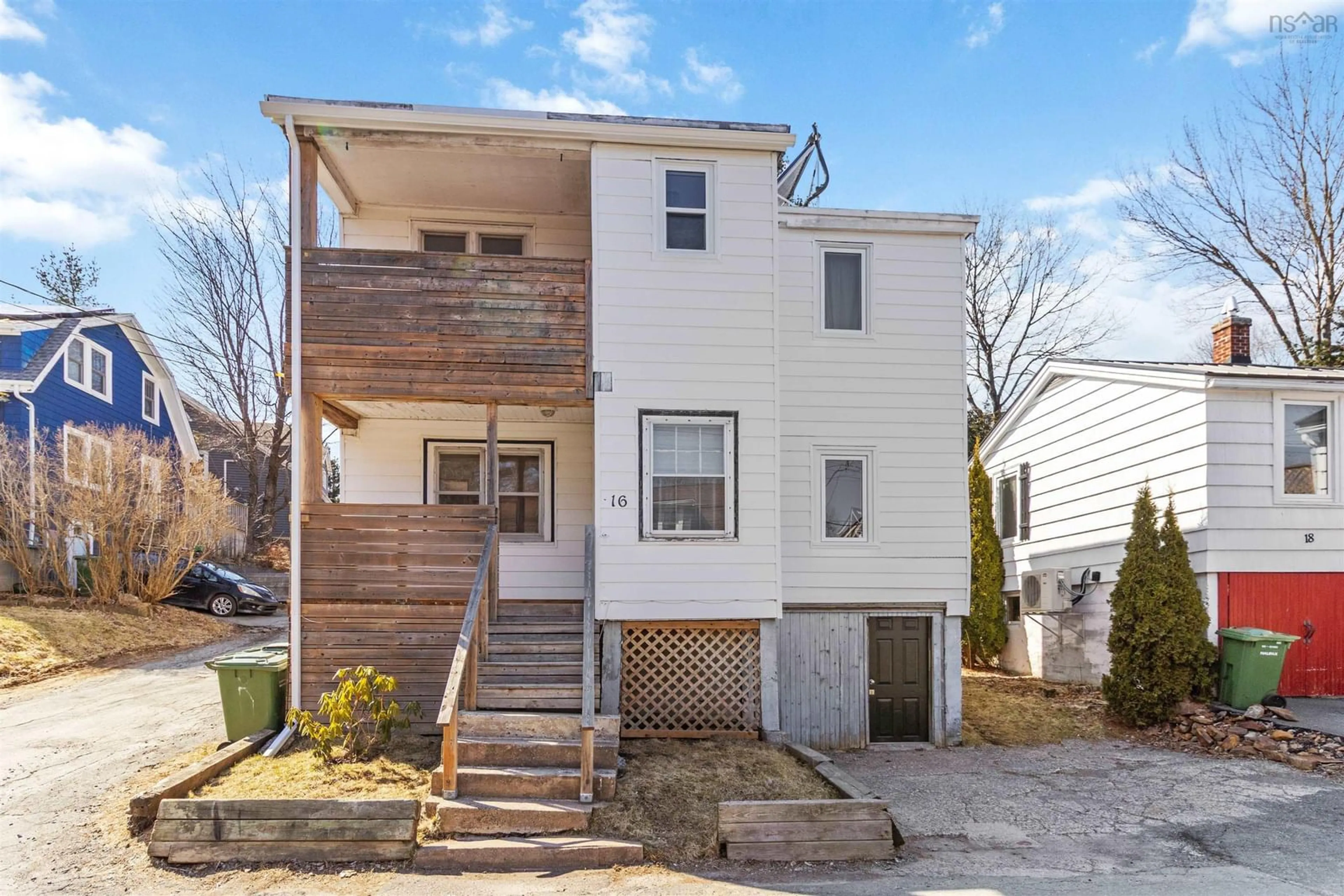 Home with vinyl exterior material, street for 16 Cottage Road, Halifax Nova Scotia B3N 1H3