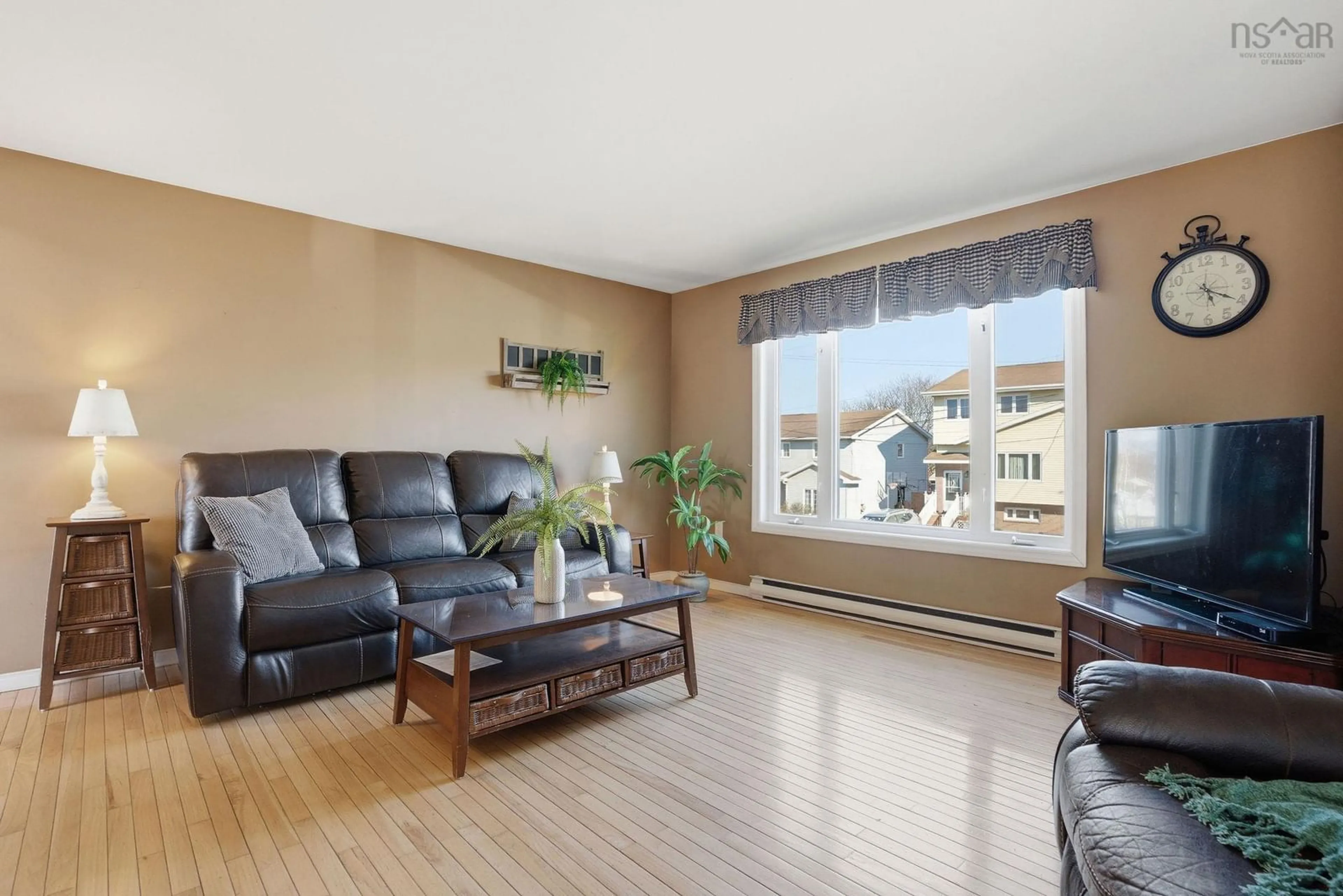 Living room with furniture, wood/laminate floor for 1 Oakwood Crt, Dartmouth Nova Scotia B2W 5P8