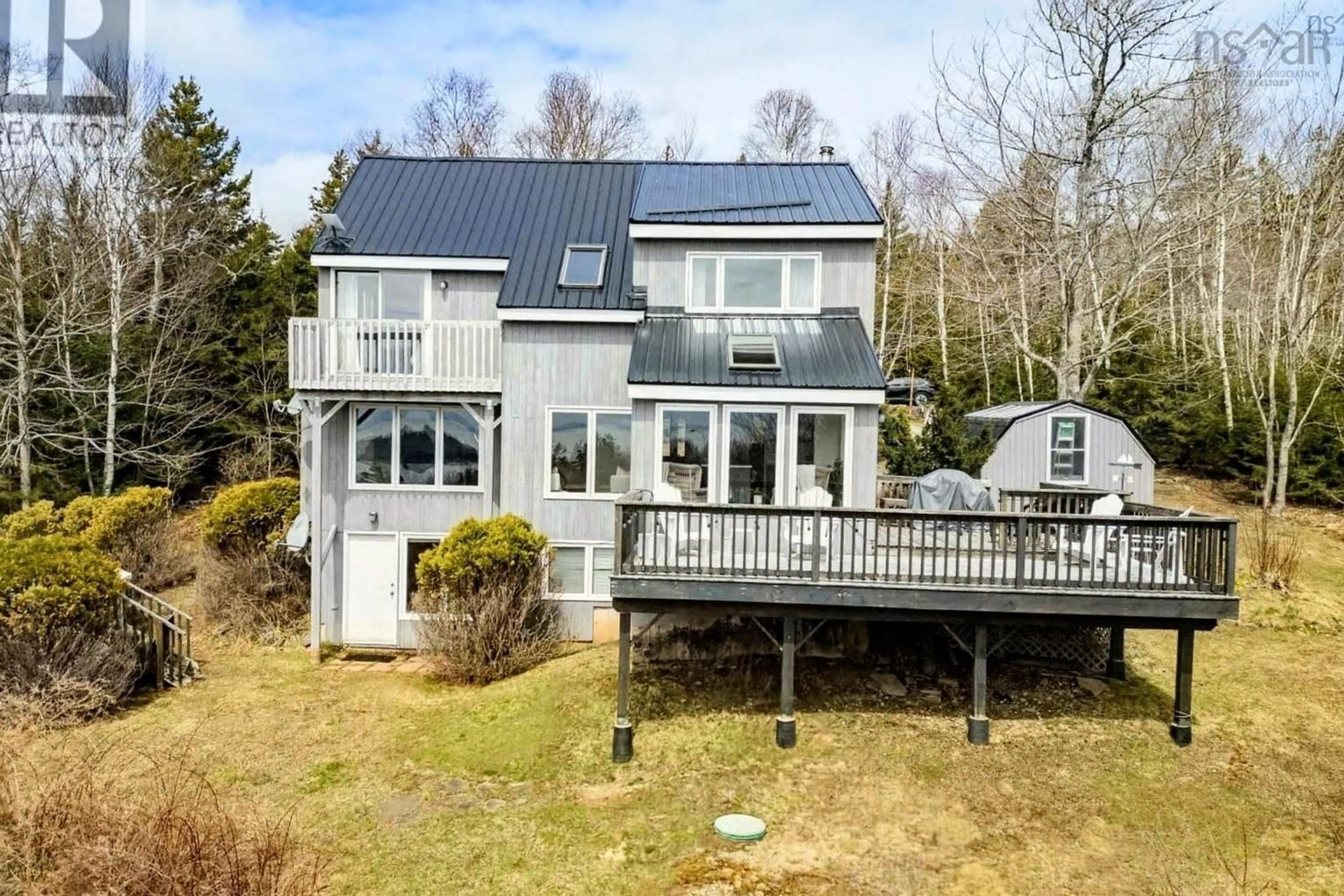 A pic from outside/outdoor area/front of a property/back of a property/a pic from drone, water/lake/river/ocean view for 72 Spring Tide Lane, Two Islands Nova Scotia B0M 1S0