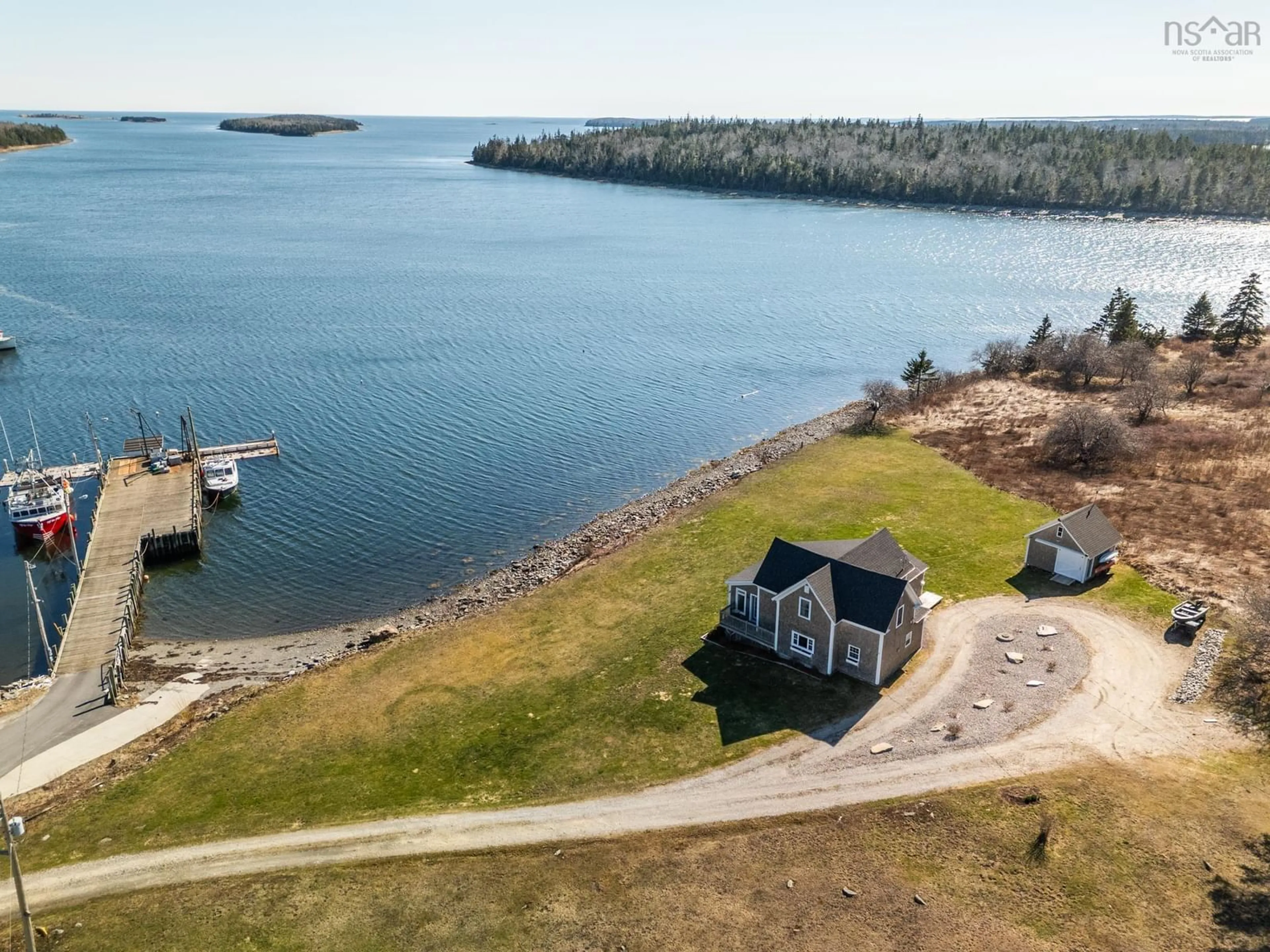 A pic from outside/outdoor area/front of a property/back of a property/a pic from drone, water/lake/river/ocean view for 5 Highway 308, Morris Island Nova Scotia B0W 3M0