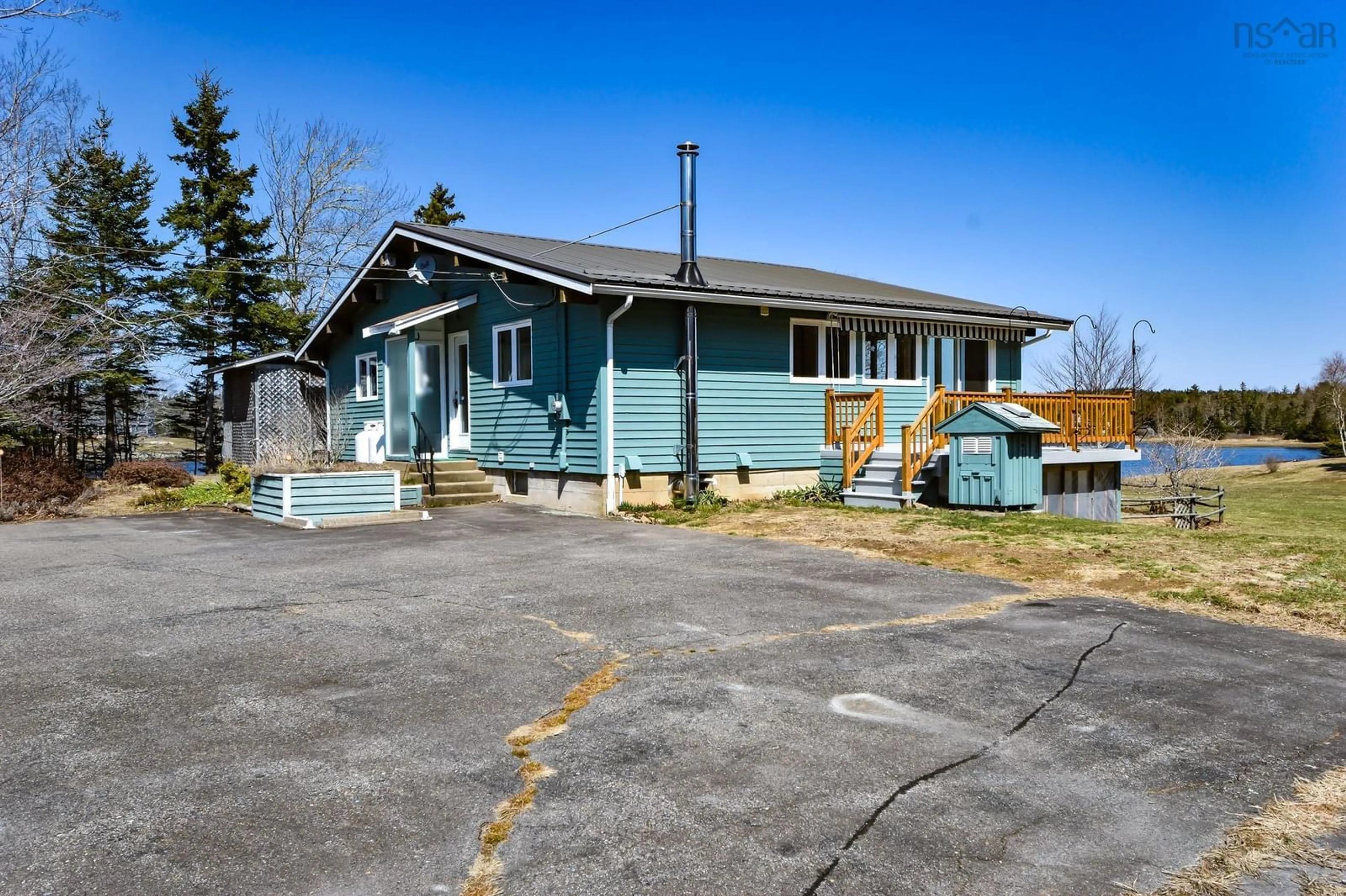 A pic from outside/outdoor area/front of a property/back of a property/a pic from drone, street for 67 Cahoon Lane, East Port Medway Nova Scotia B0J 2H0