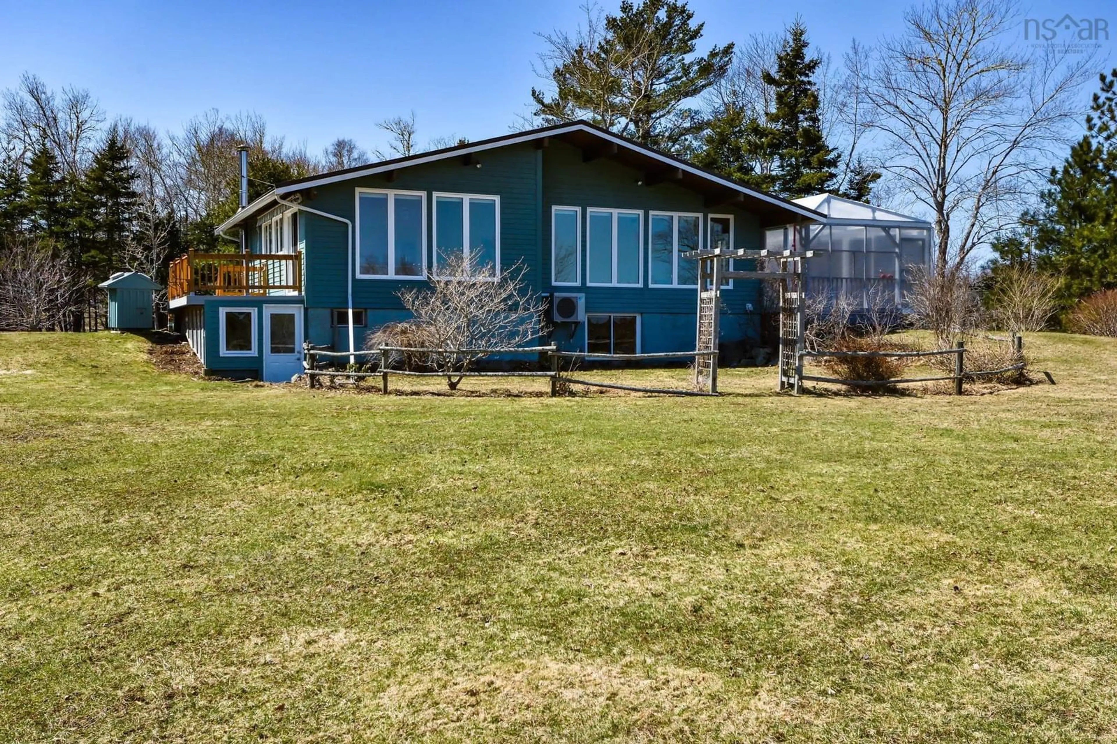 A pic from outside/outdoor area/front of a property/back of a property/a pic from drone, water/lake/river/ocean view for 67 Cahoon Lane, East Port Medway Nova Scotia B0J 2H0