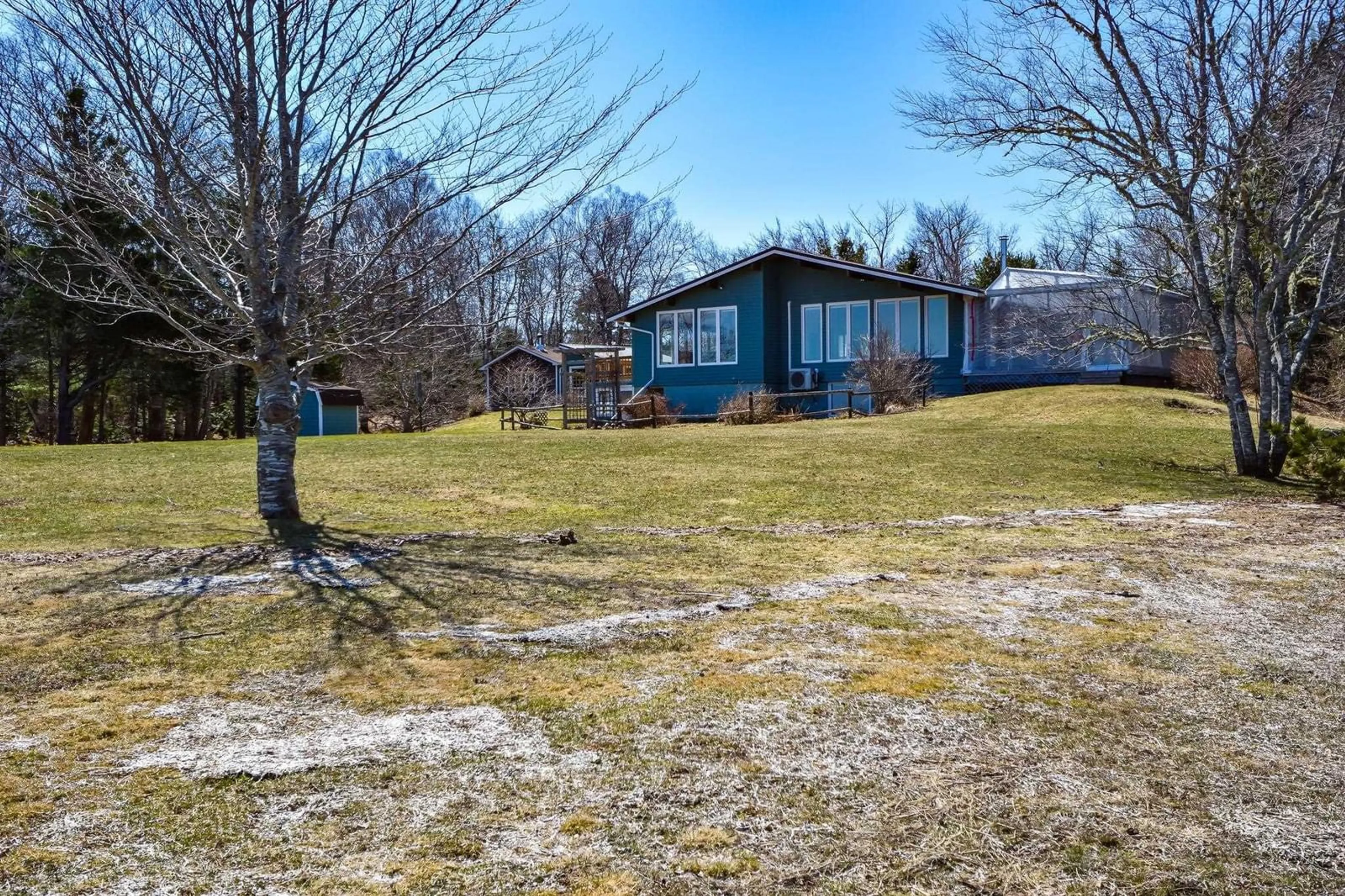 A pic from outside/outdoor area/front of a property/back of a property/a pic from drone, water/lake/river/ocean view for 67 Cahoon Lane, East Port Medway Nova Scotia B0J 2H0