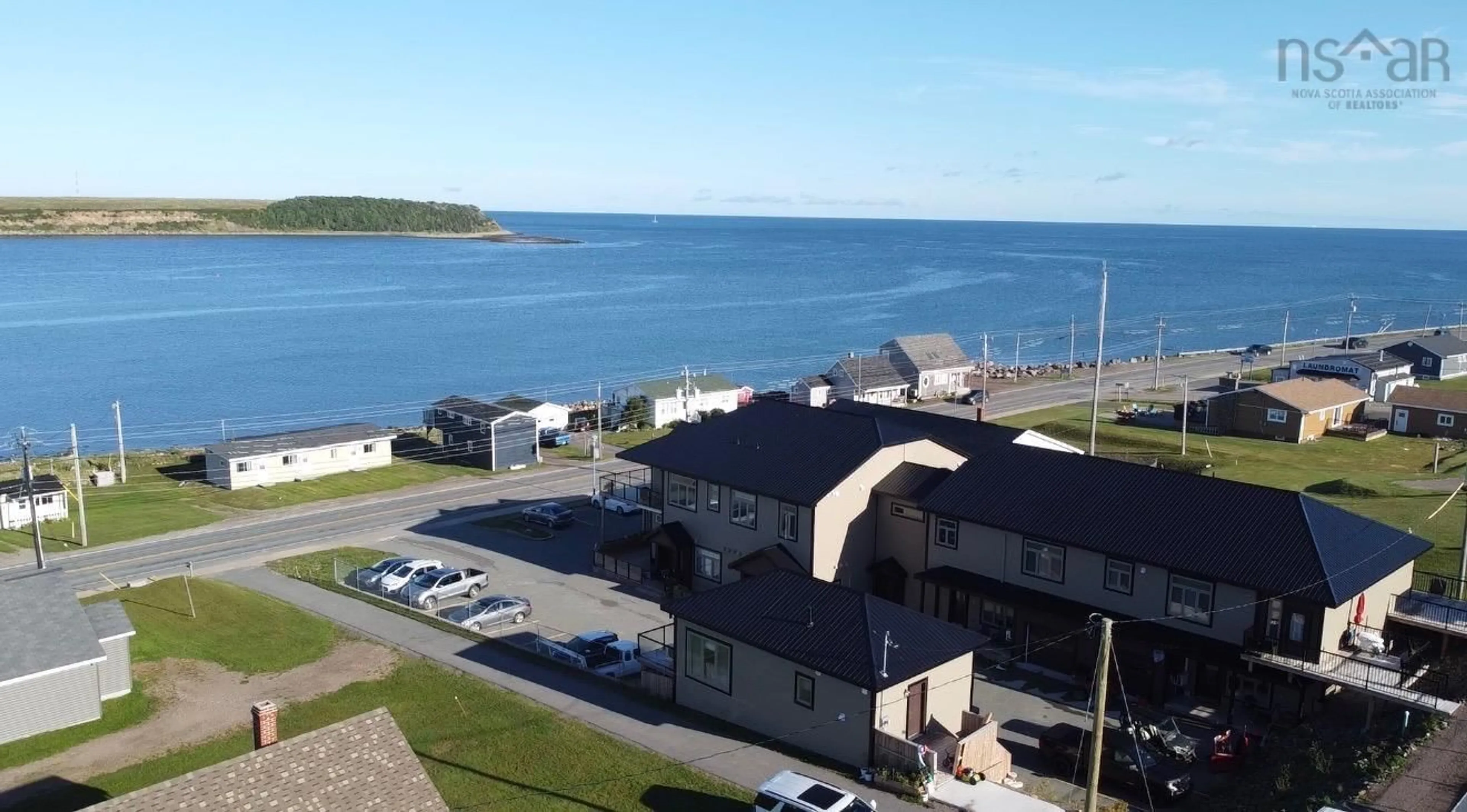 A pic from outside/outdoor area/front of a property/back of a property/a pic from drone, water/lake/river/ocean view for 15482 Cabot Trail, Chéticamp Nova Scotia B0E 1H0