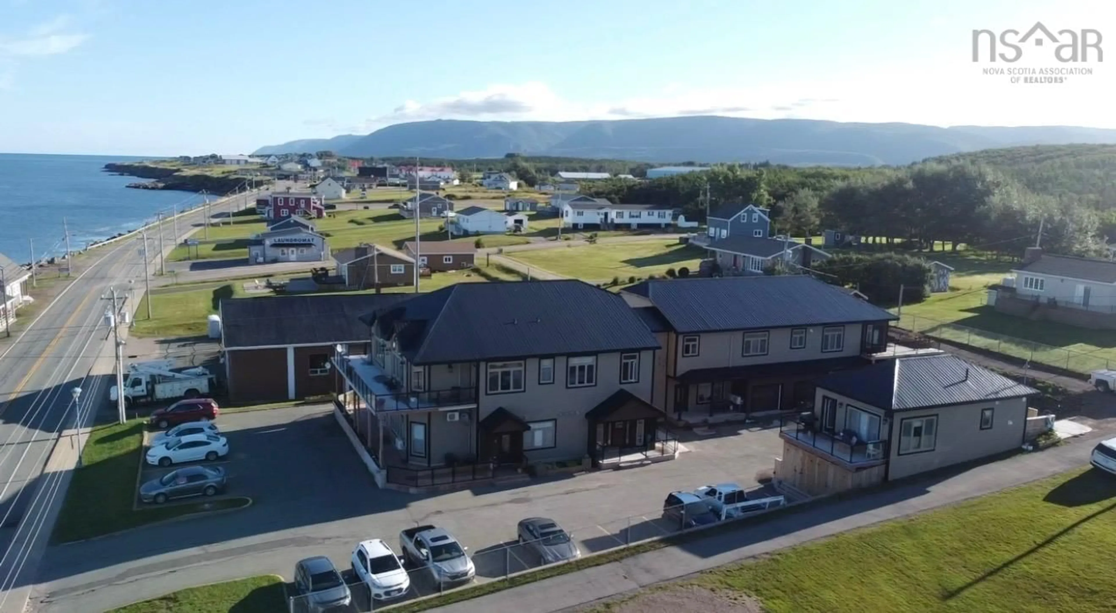 A pic from outside/outdoor area/front of a property/back of a property/a pic from drone, mountain view for 15482 Cabot Trail, Chéticamp Nova Scotia B0E 1H0