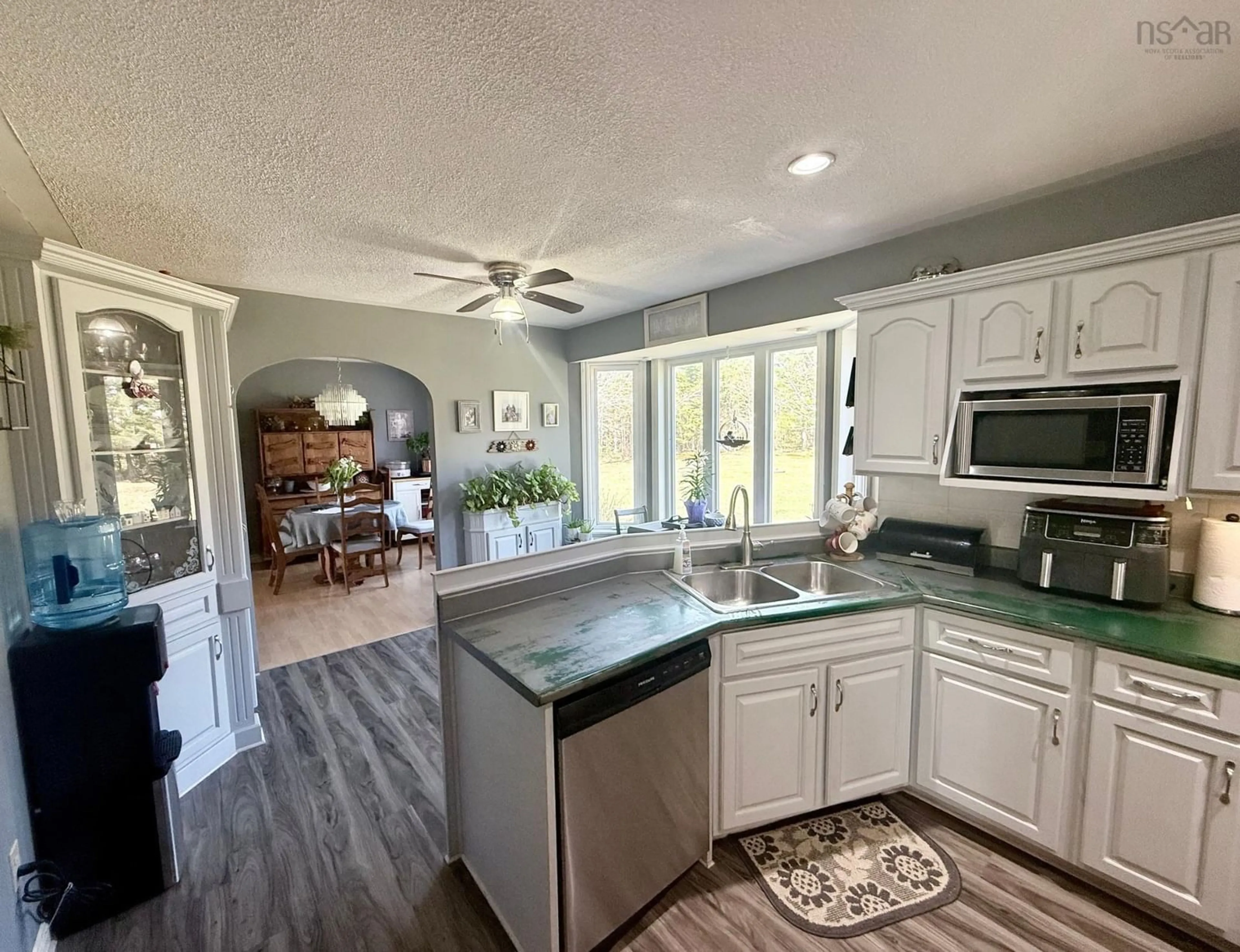 Open concept kitchen, ceramic/tile floor for 7514 Highway 3, Ste. Anne Du Ruisseau Nova Scotia B0W 2X0