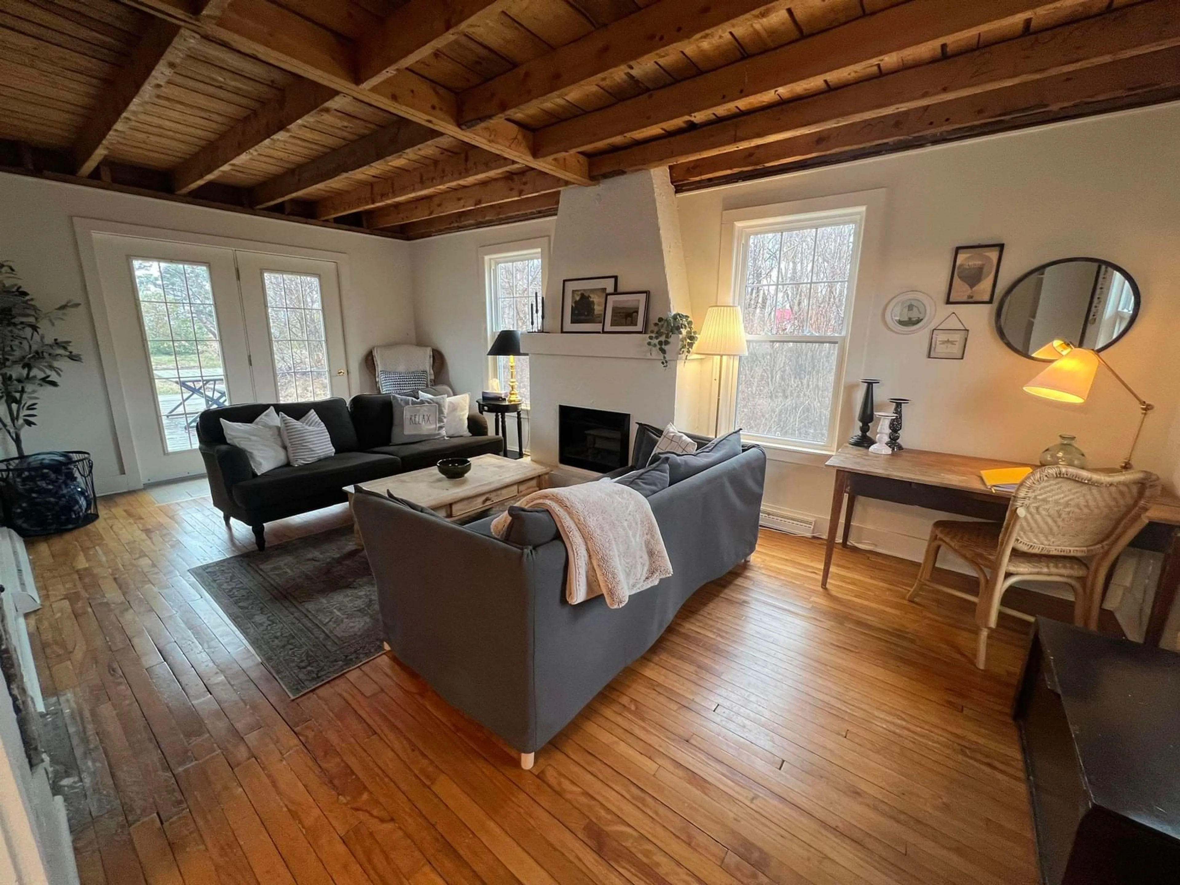 Living room with furniture, wood/laminate floor for 2703 Highway 362 Hwy, Margaretsville Nova Scotia B0S 1P0