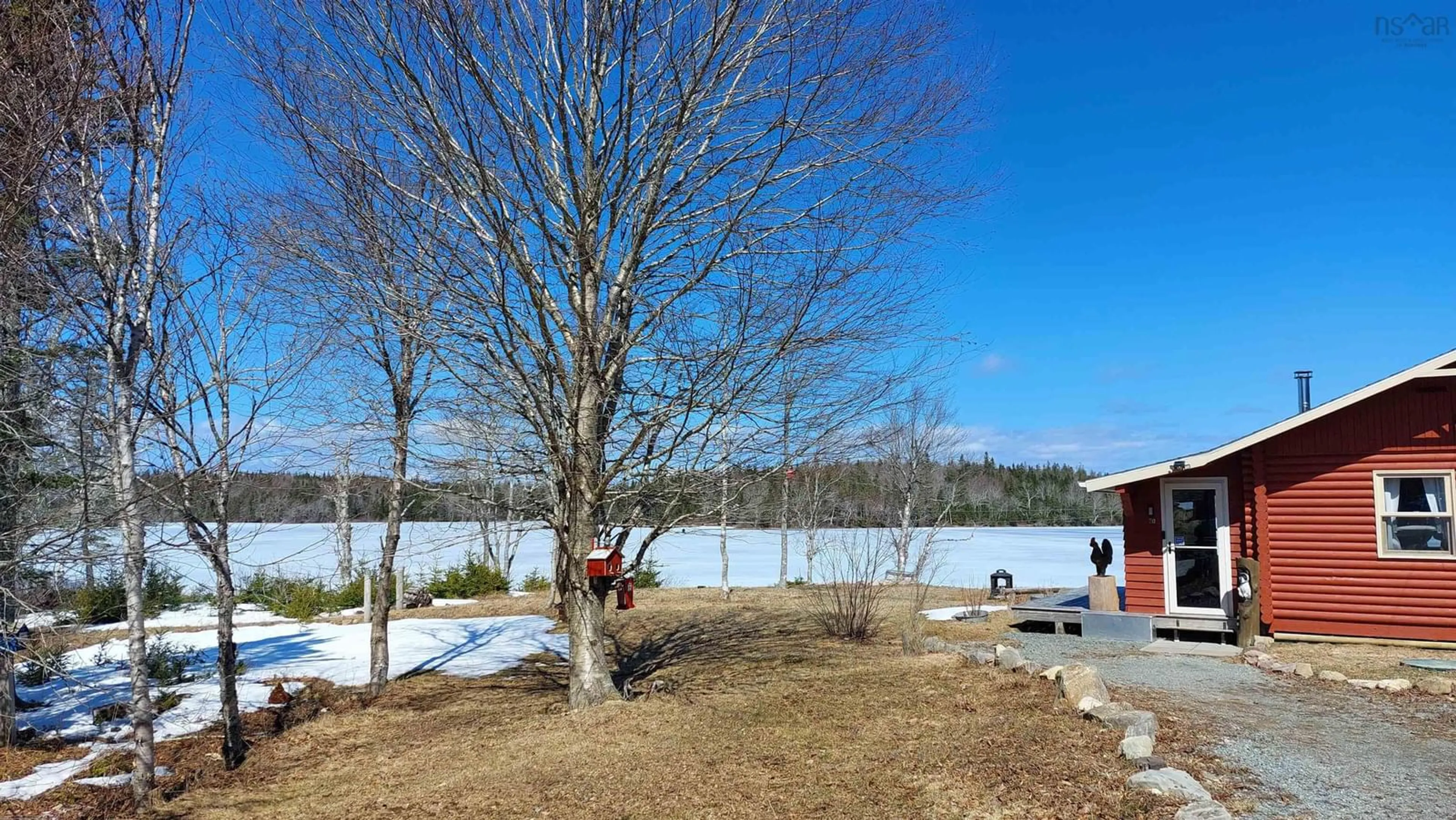 A pic from outside/outdoor area/front of a property/back of a property/a pic from drone, water/lake/river/ocean view for 60 Hummingbird Lane, Loch Lomond Nova Scotia B2E 1C4