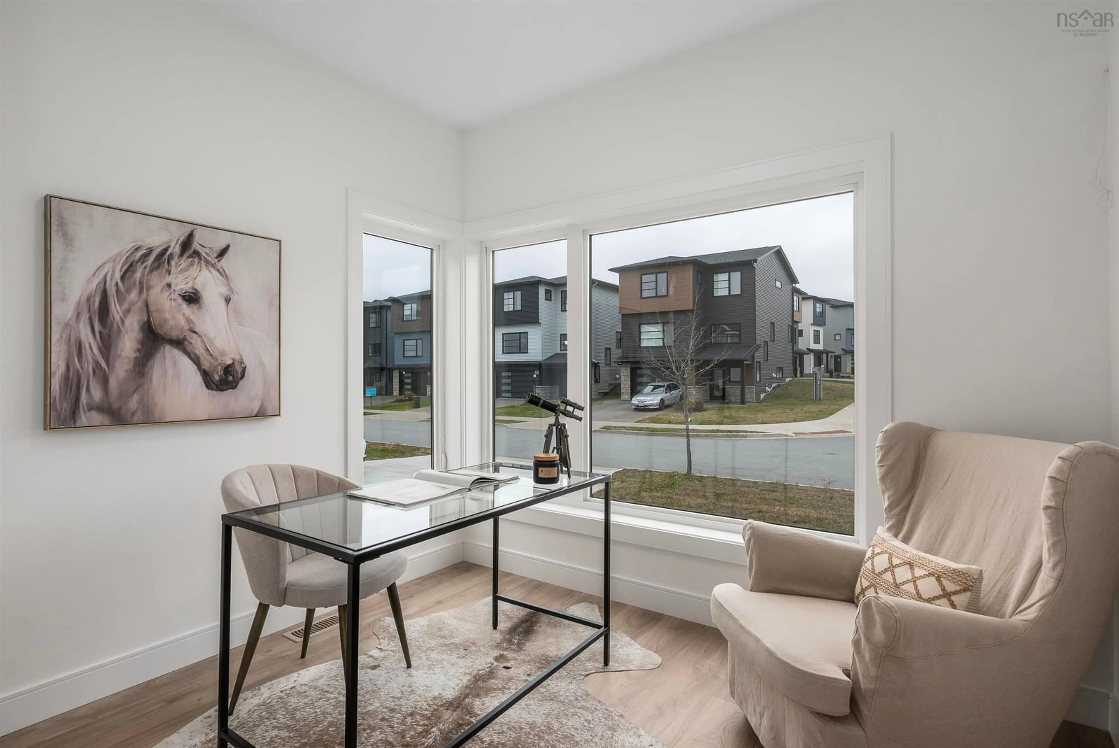 Living room with furniture, wood/laminate floor for 71 Tuscany Run, Timberlea Nova Scotia B3T 0L2