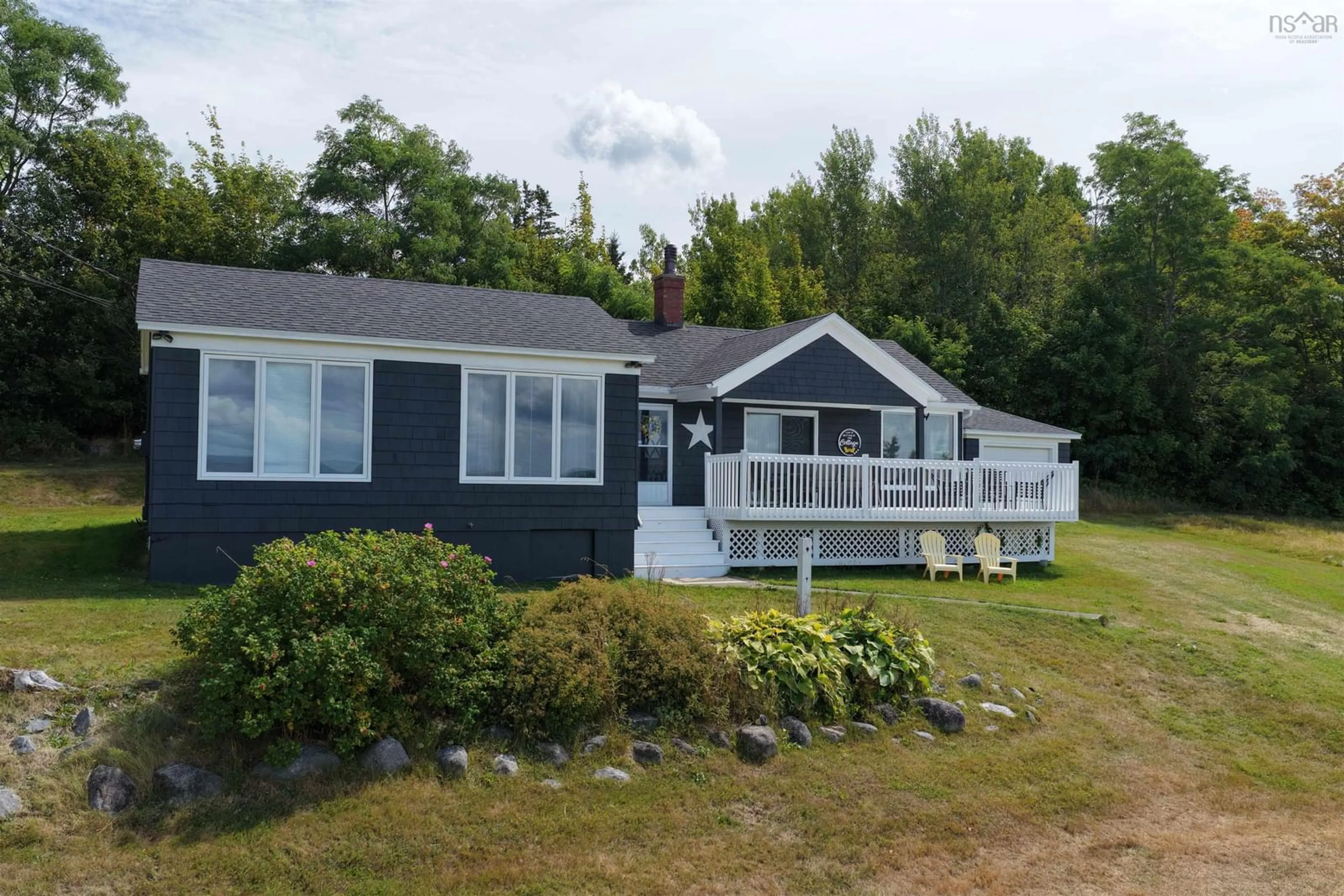 A pic from outside/outdoor area/front of a property/back of a property/a pic from drone, water/lake/river/ocean view for 939 Georges River Rd, Georges River Nova Scotia B1Y 3E2