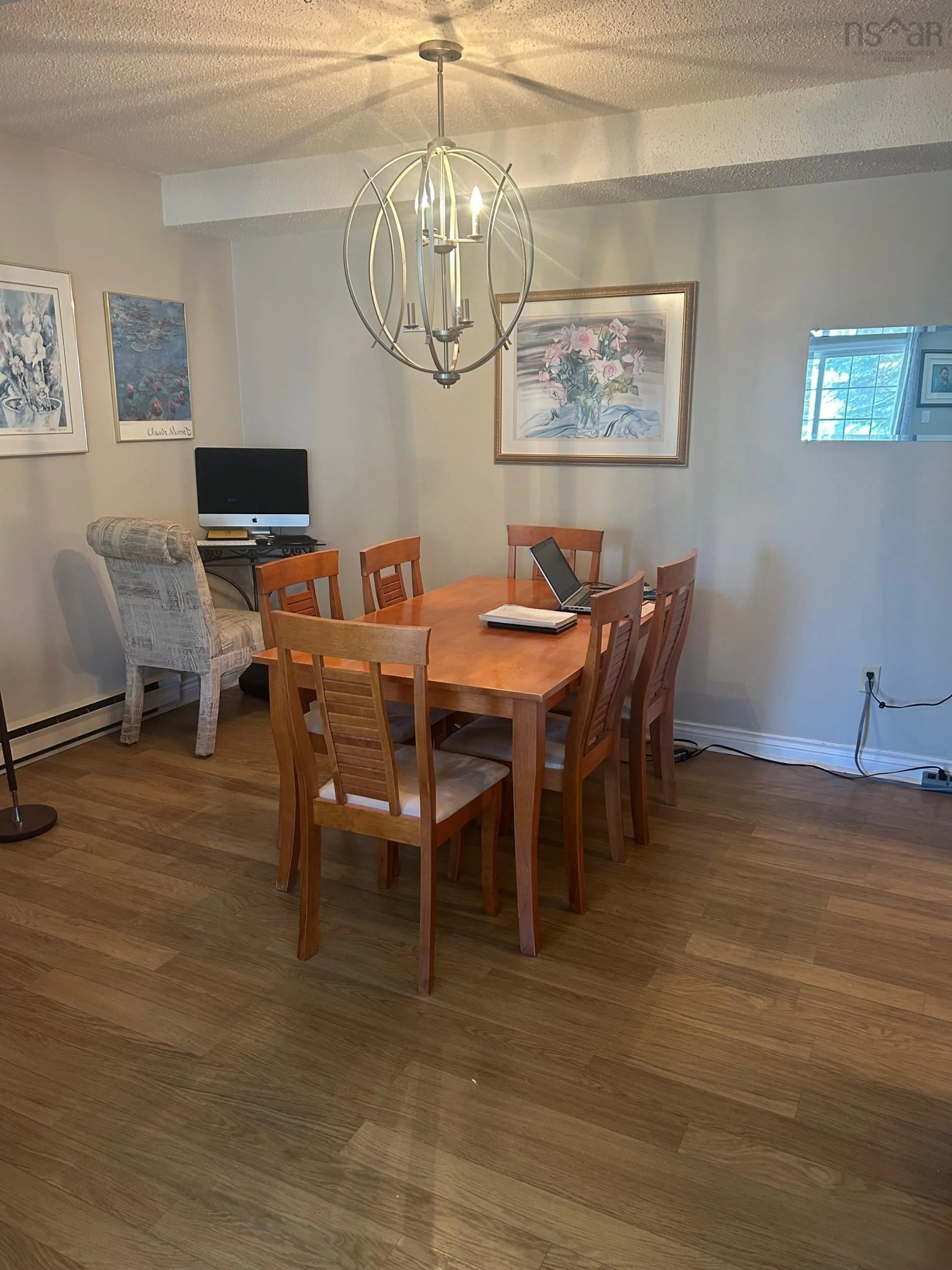 Dining room, wood/laminate floor for 95 Empire St #Unit 2, Bridgewater Nova Scotia B4V 2L8