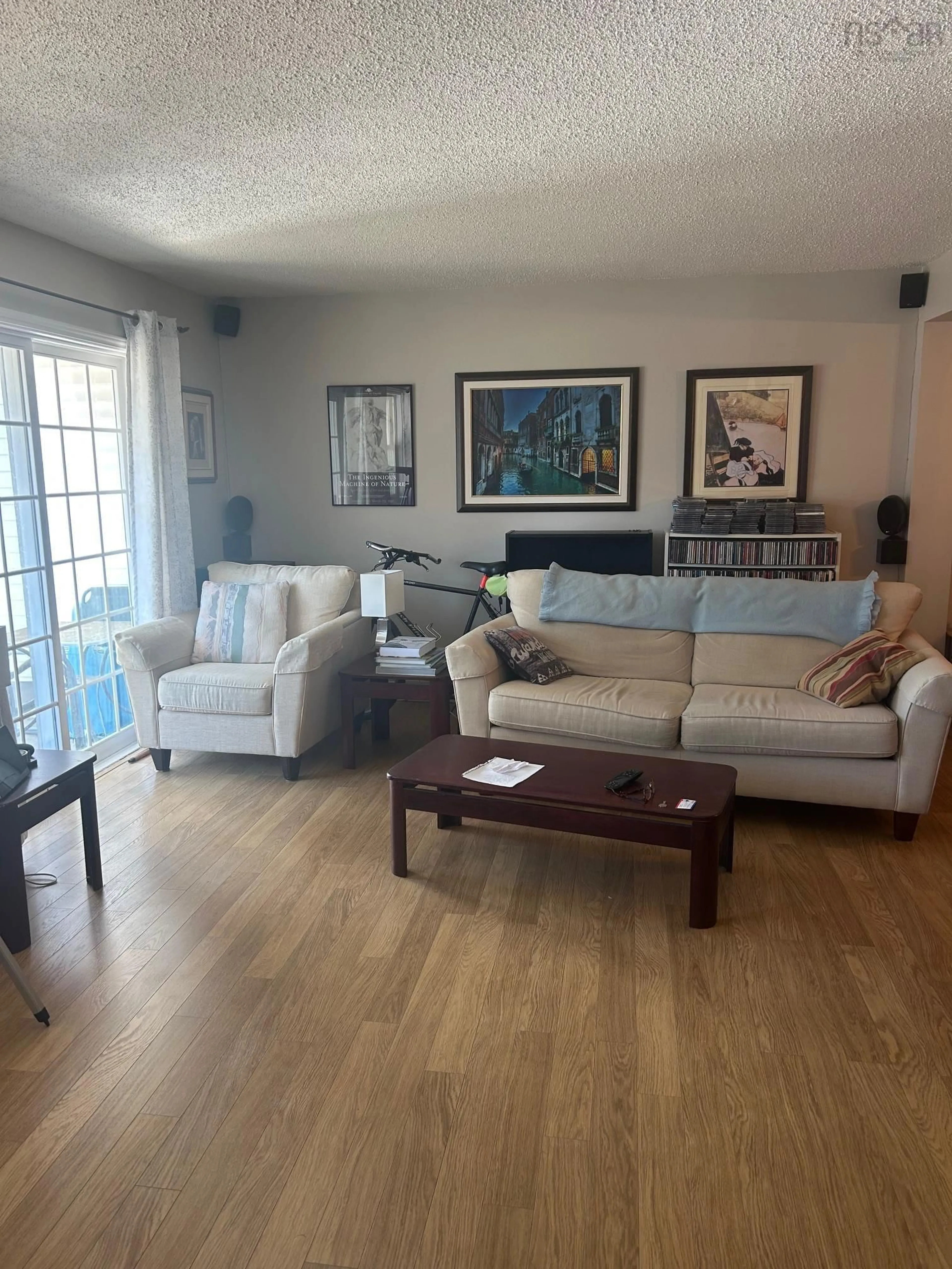 Living room with furniture, wood/laminate floor for 95 Empire St #Unit 2, Bridgewater Nova Scotia B4V 2L8