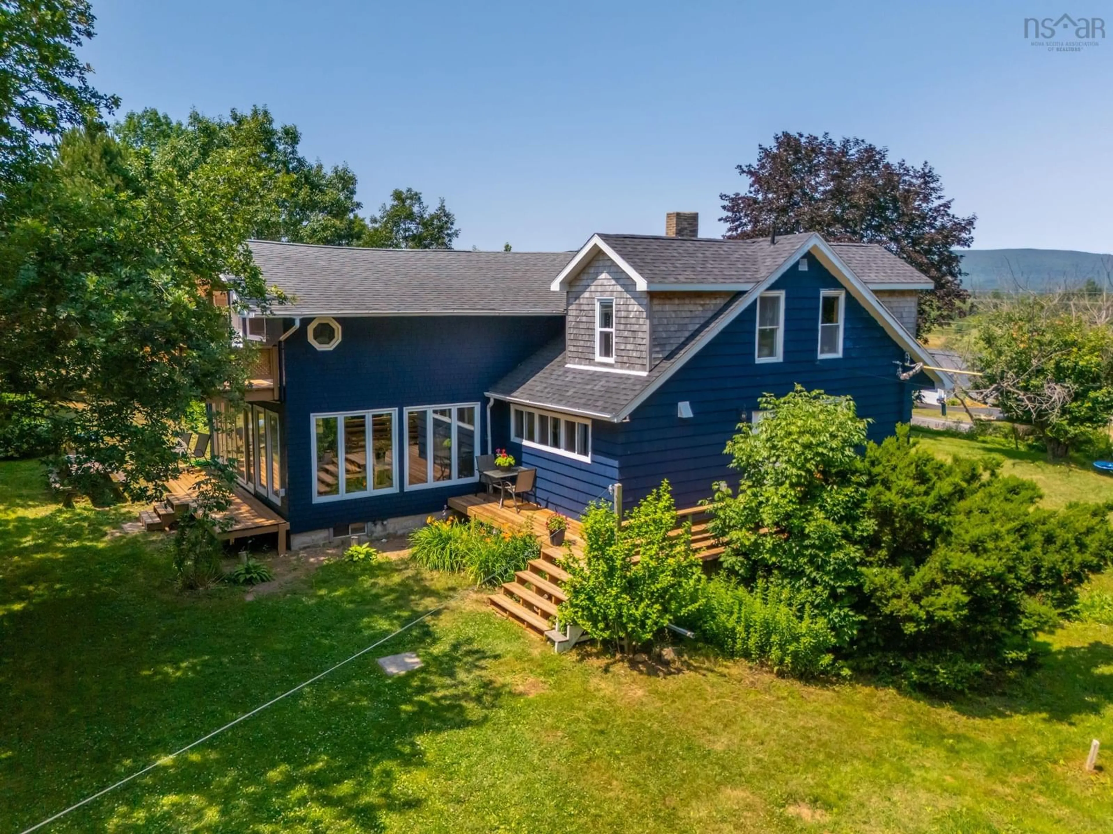 A pic from outside/outdoor area/front of a property/back of a property/a pic from drone, unknown for 1242 Highway 201, Round Hill Nova Scotia B0S 1A0