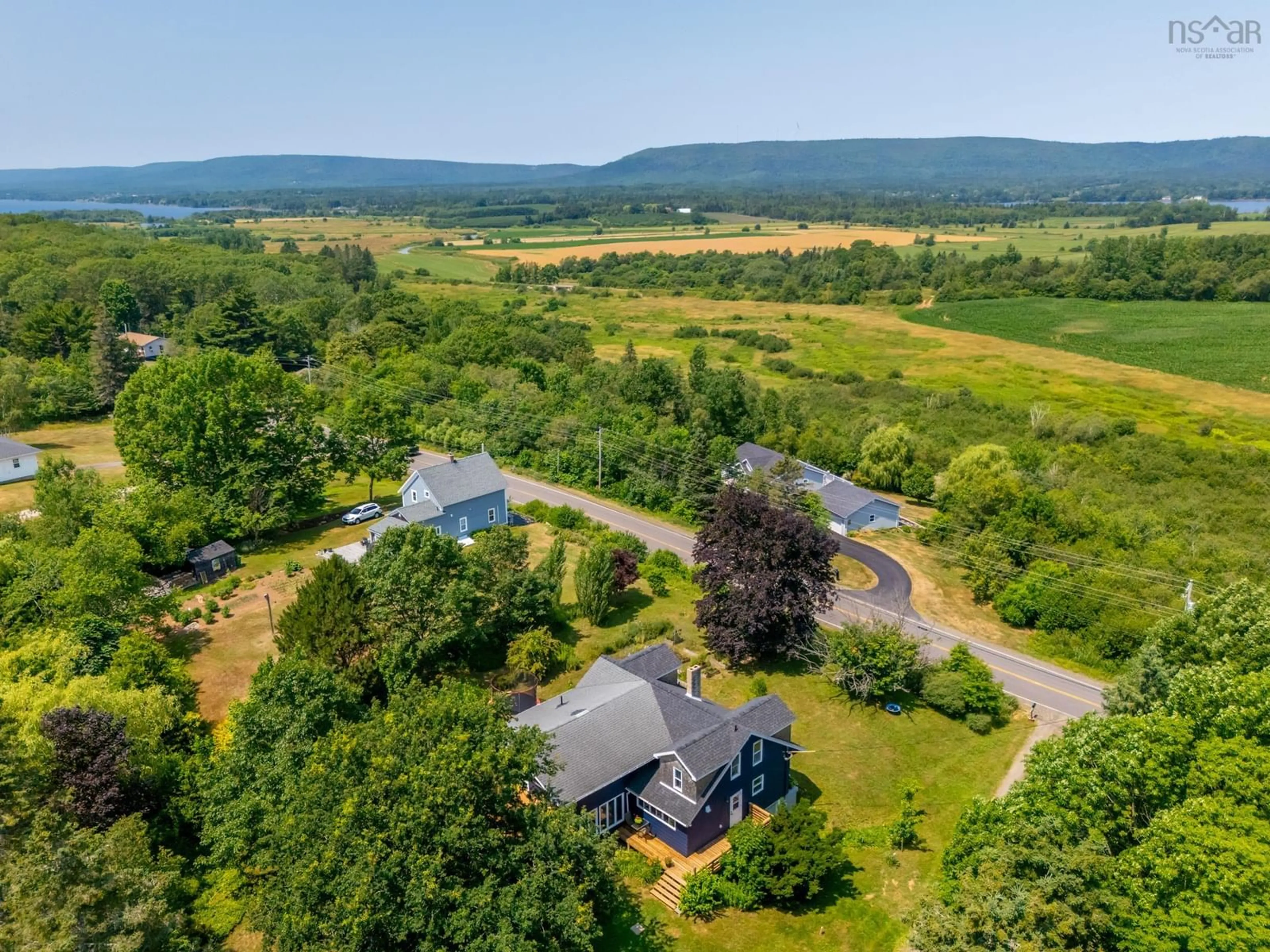 A pic from outside/outdoor area/front of a property/back of a property/a pic from drone, water/lake/river/ocean view for 1242 Highway 201, Round Hill Nova Scotia B0S 1A0