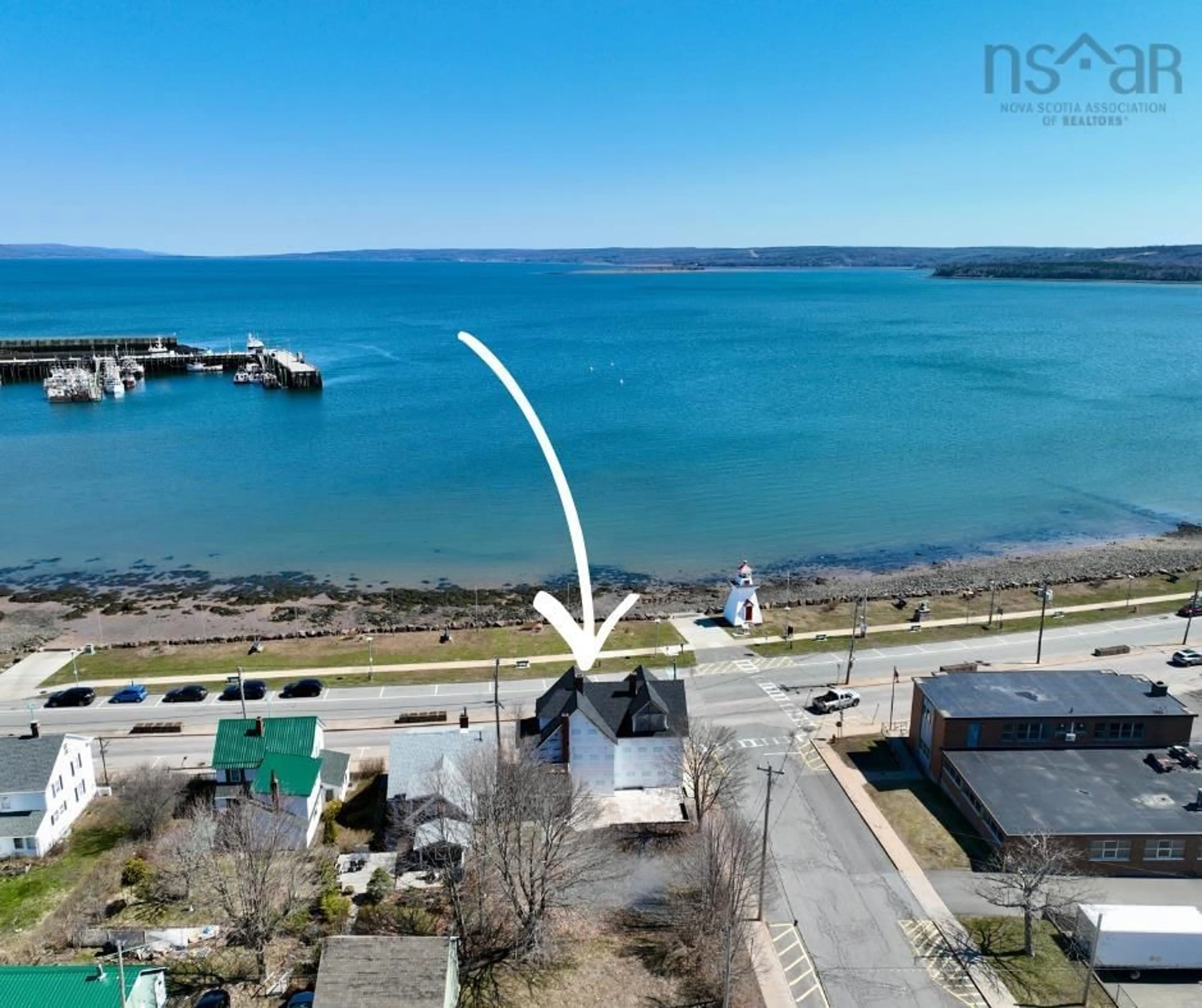 A pic from outside/outdoor area/front of a property/back of a property/a pic from drone, water/lake/river/ocean view for 9 Water St, Digby Nova Scotia B0V 1A0