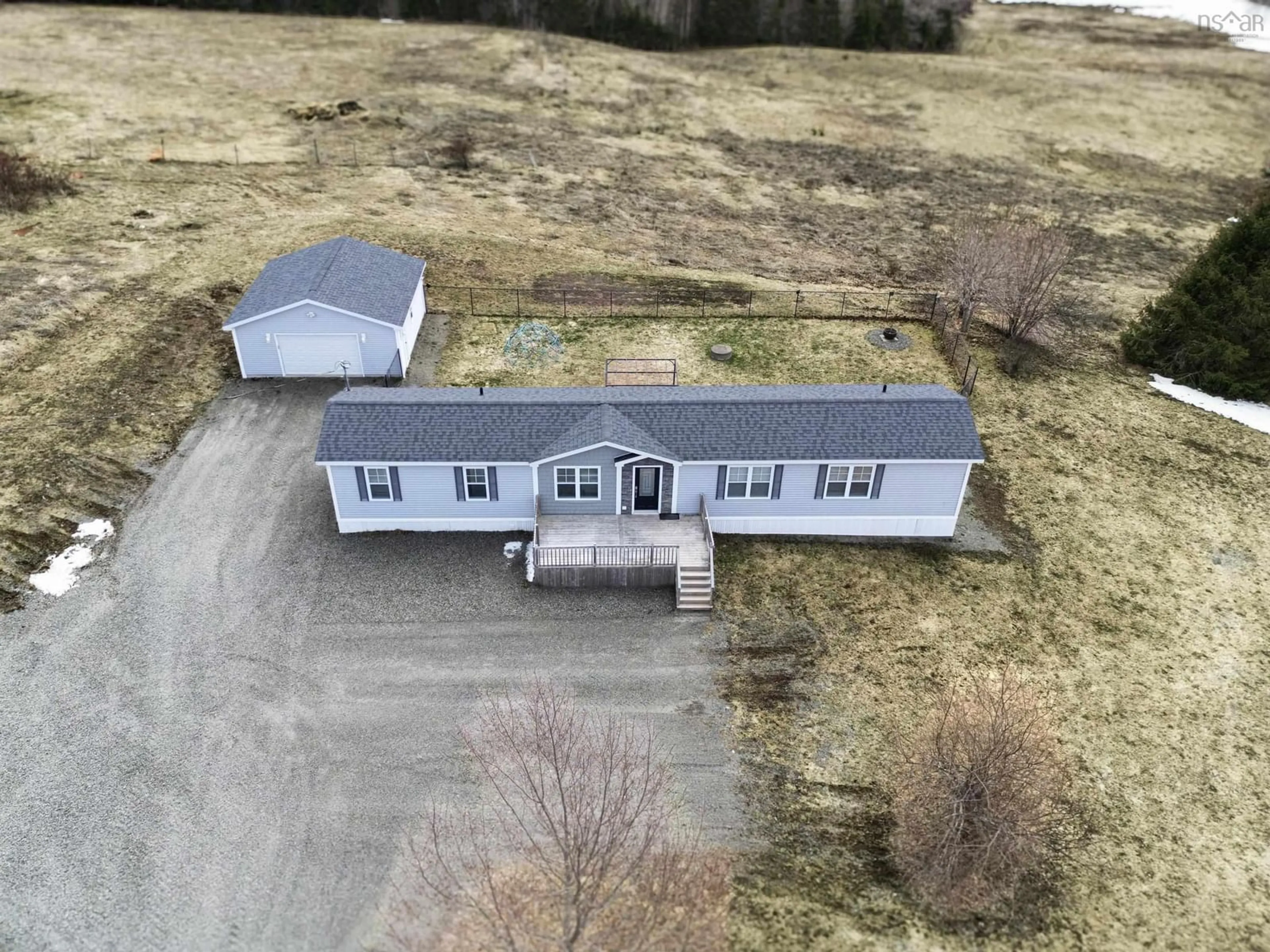 A pic from outside/outdoor area/front of a property/back of a property/a pic from drone, building for 2131 Coxheath Rd, Sydney Forks Nova Scotia B1L 1A5