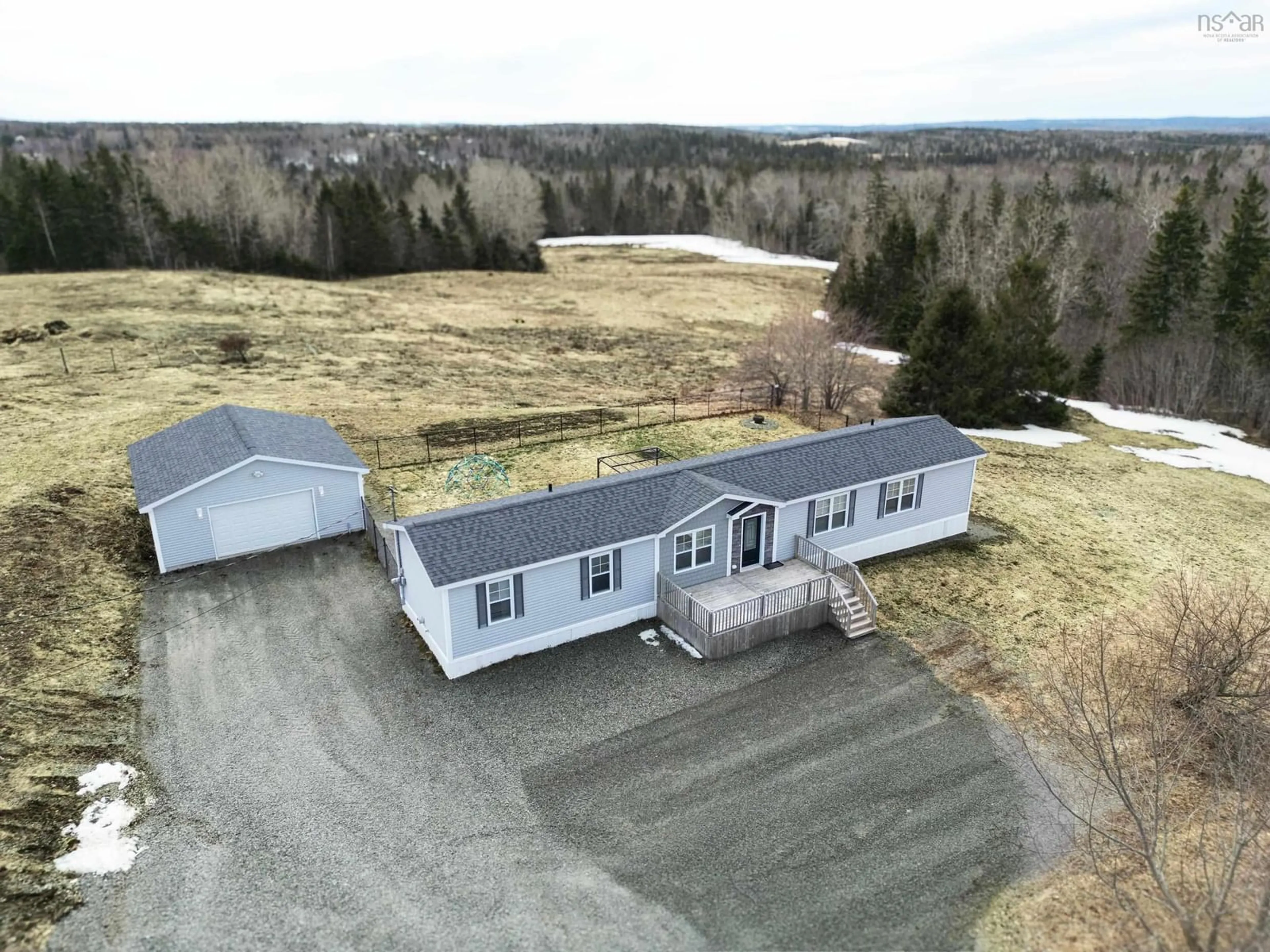 A pic from outside/outdoor area/front of a property/back of a property/a pic from drone, building for 2131 Coxheath Rd, Sydney Forks Nova Scotia B1L 1A5