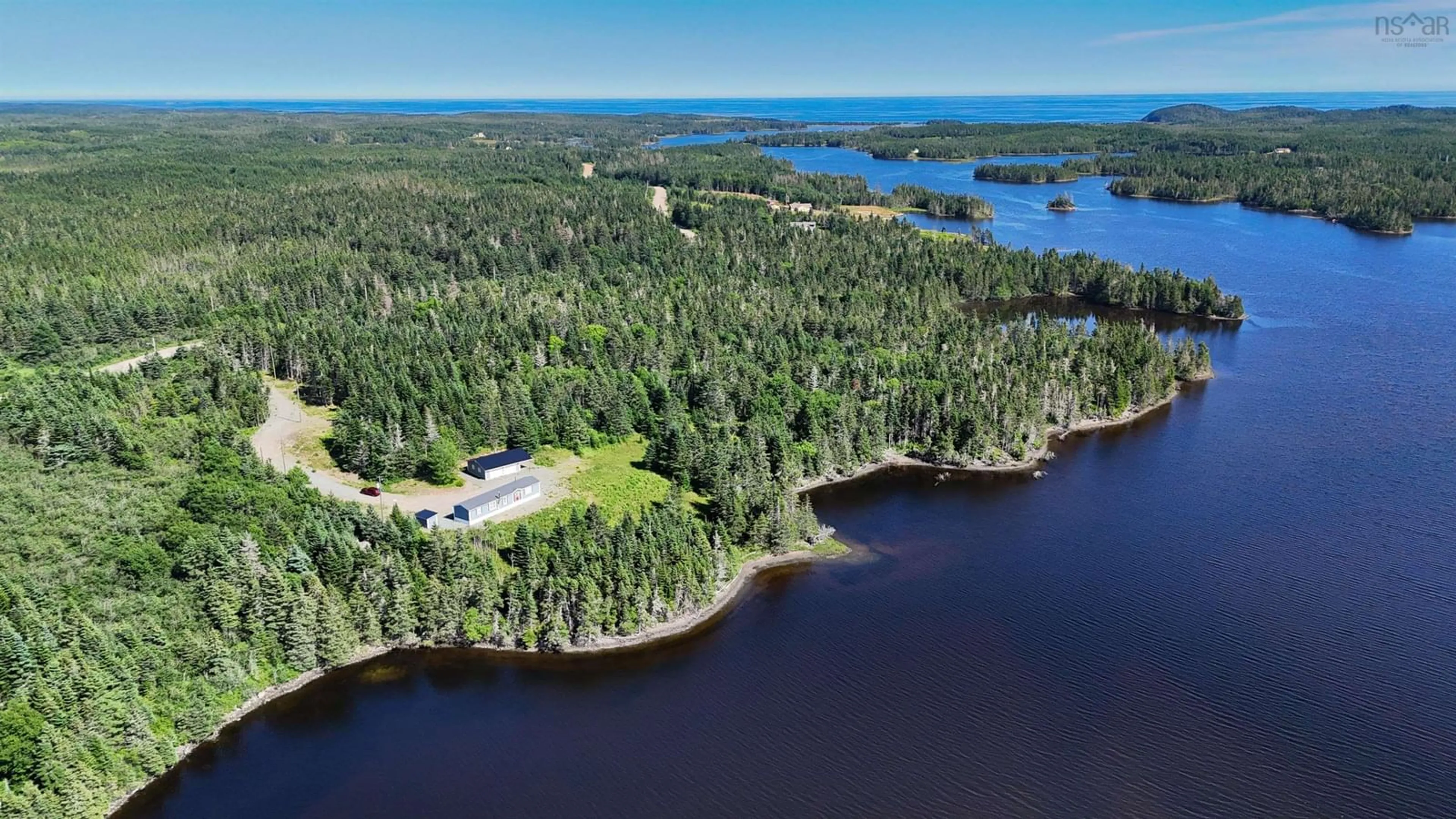 A pic from outside/outdoor area/front of a property/back of a property/a pic from drone, water/lake/river/ocean view for 290 Eastside Grand River Rd, Grand River Nova Scotia B0E 1M0