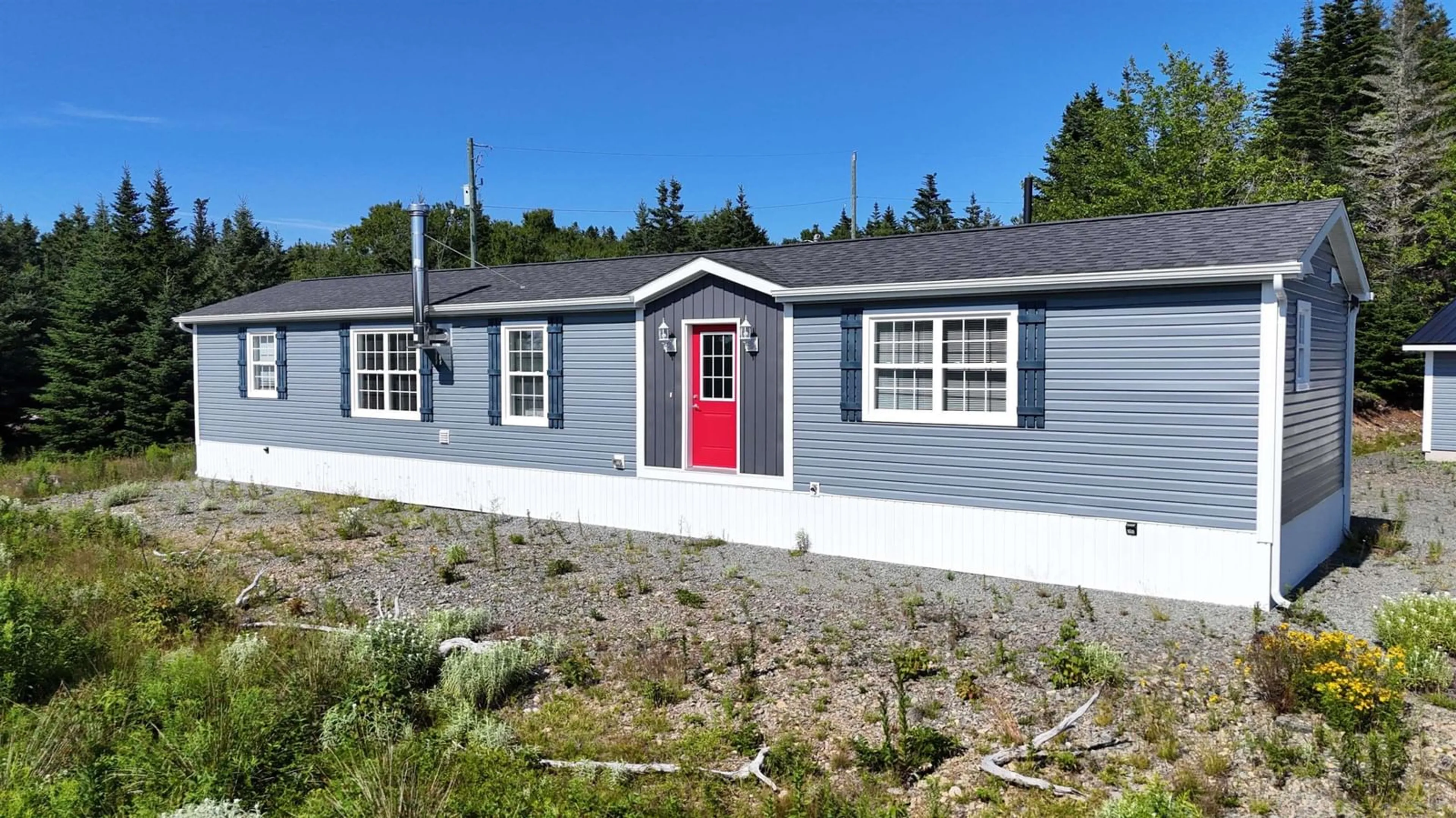 Home with vinyl exterior material, street for 290 Eastside Grand River Rd, Grand River Nova Scotia B0E 1M0
