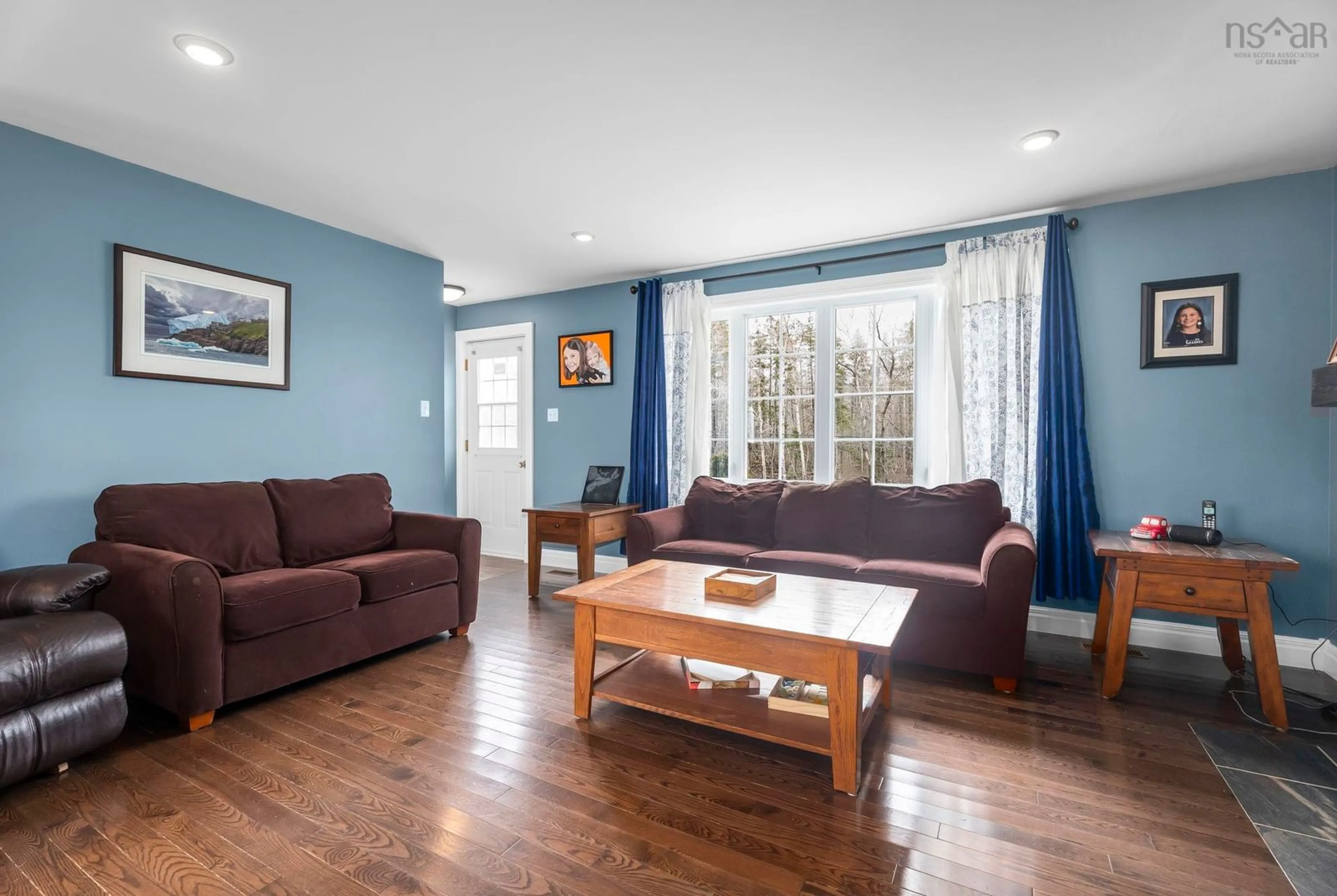 Living room with furniture, wood/laminate floor for 149 Harris Rd, Pictou Nova Scotia B0K 1H0