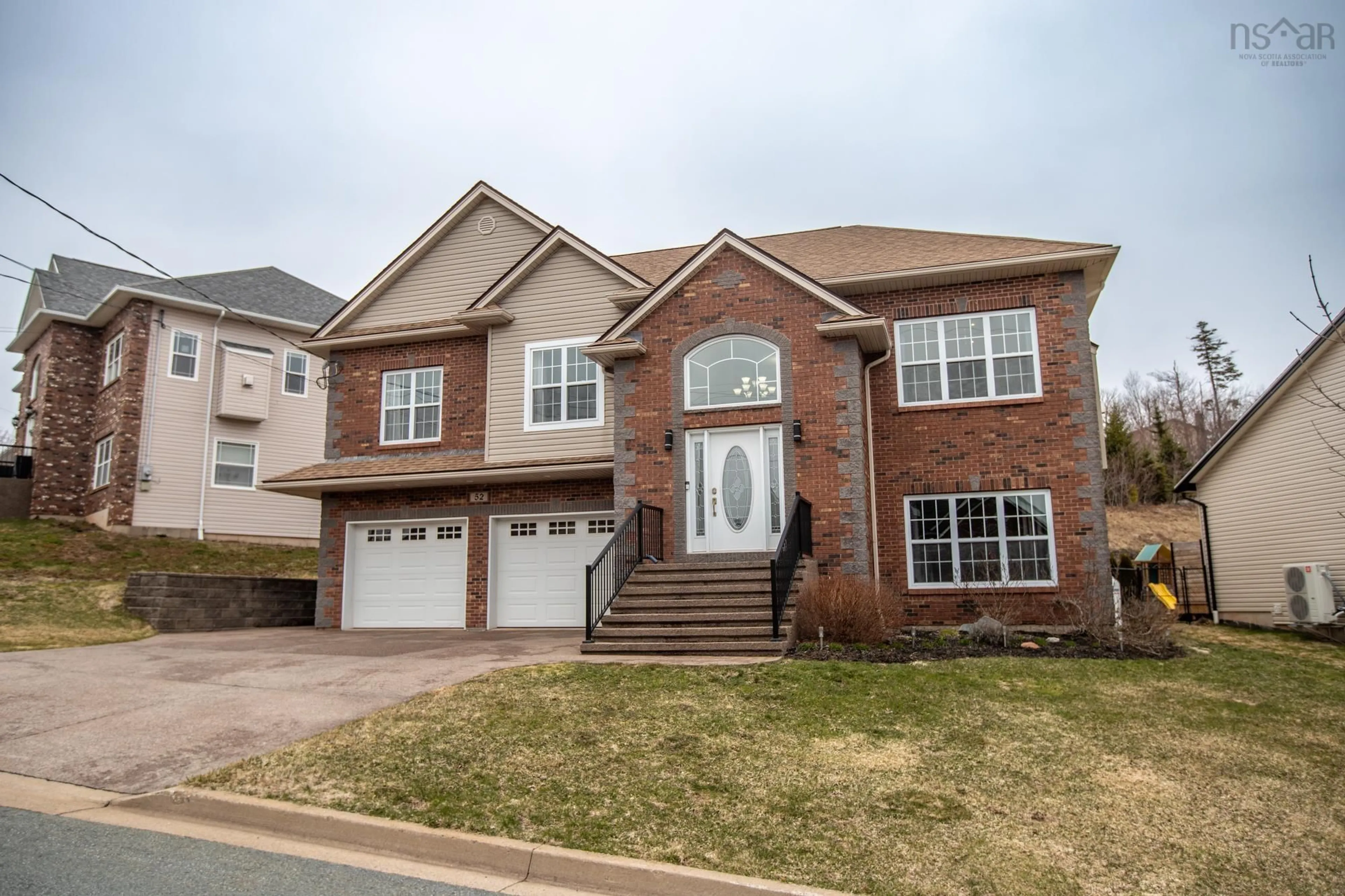 Home with brick exterior material, street for 52 Cherrywood Dr, Dartmouth Nova Scotia B2V 0A8