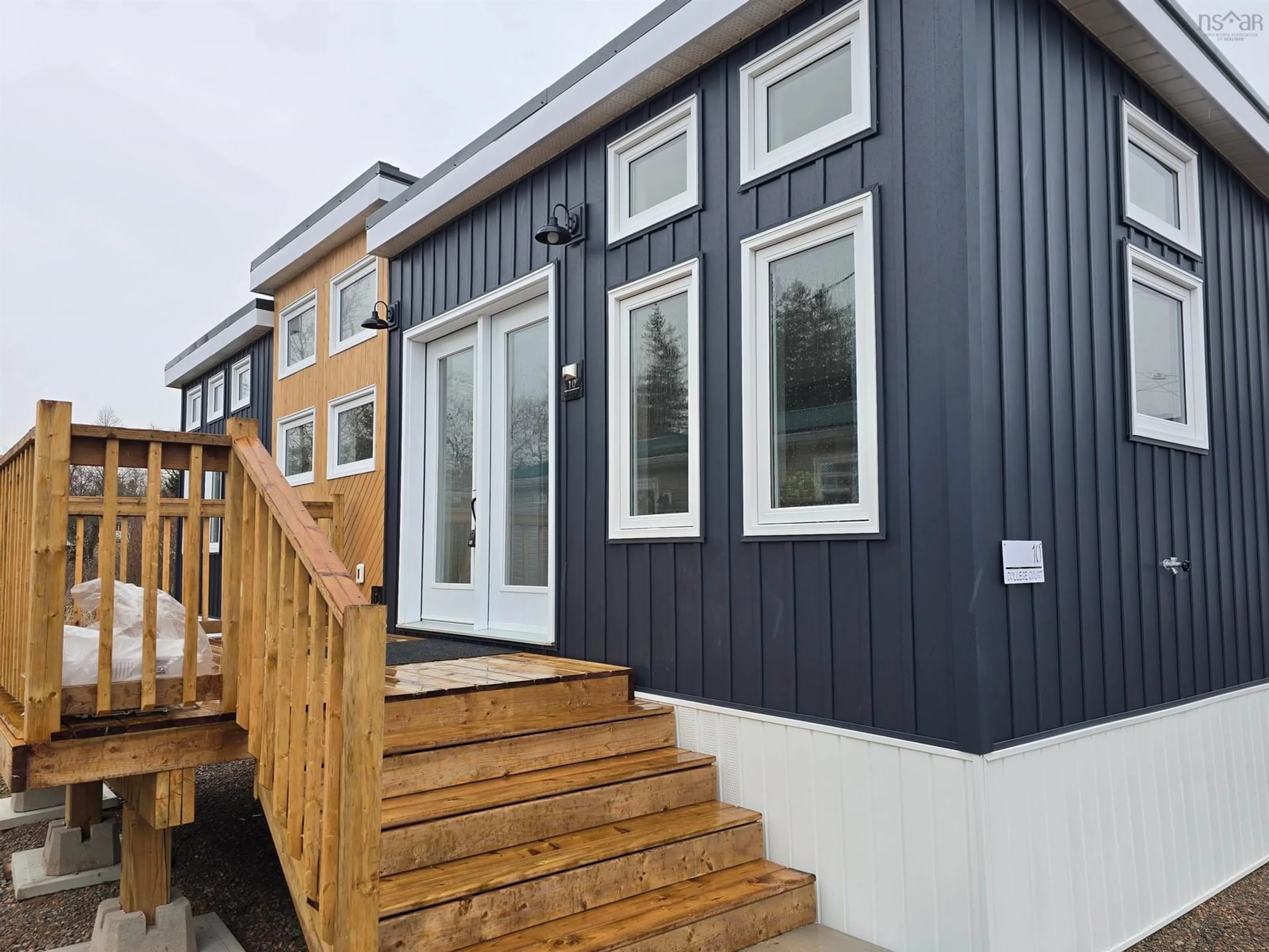 Home with vinyl exterior material, street for 10 College Crt, Bible Hill Nova Scotia B2N 7G7