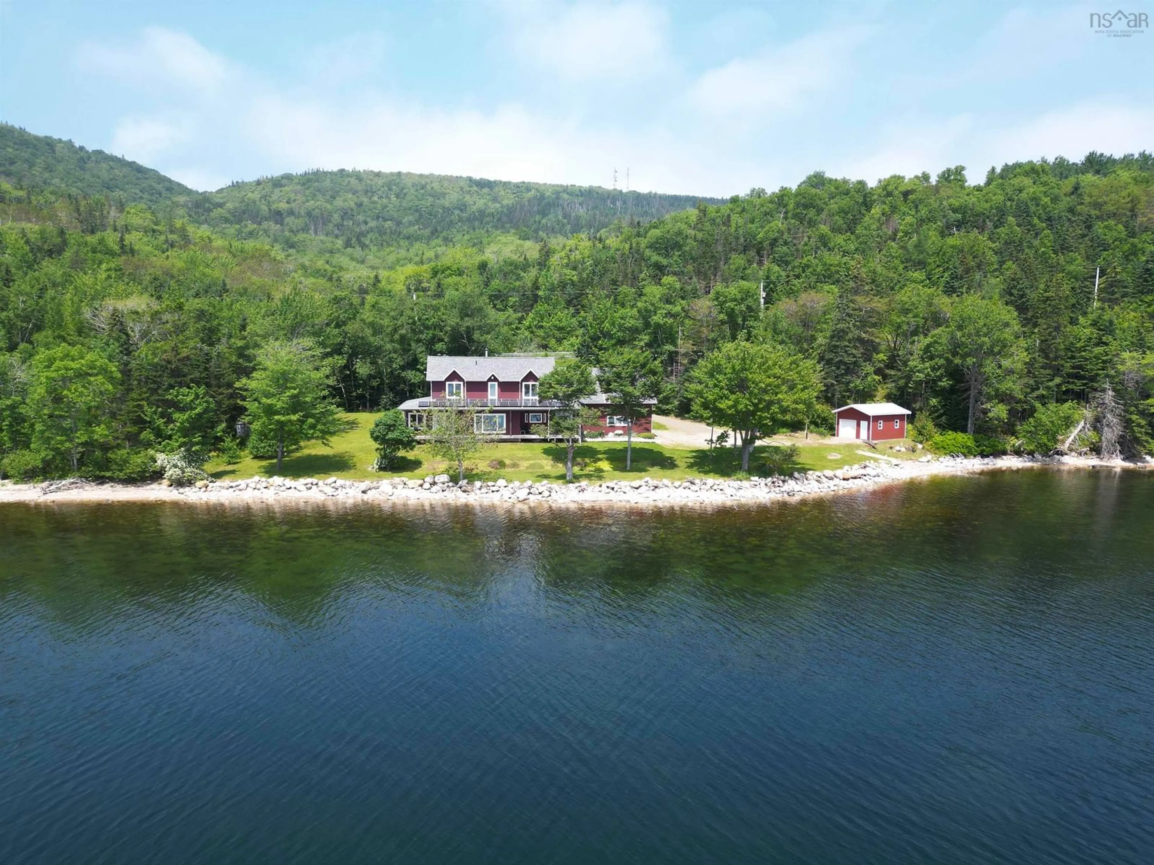 A pic from outside/outdoor area/front of a property/back of a property/a pic from drone, water/lake/river/ocean view for 5276 Marble Mountain Rd., Marble Mountain Nova Scotia B0E 3K0