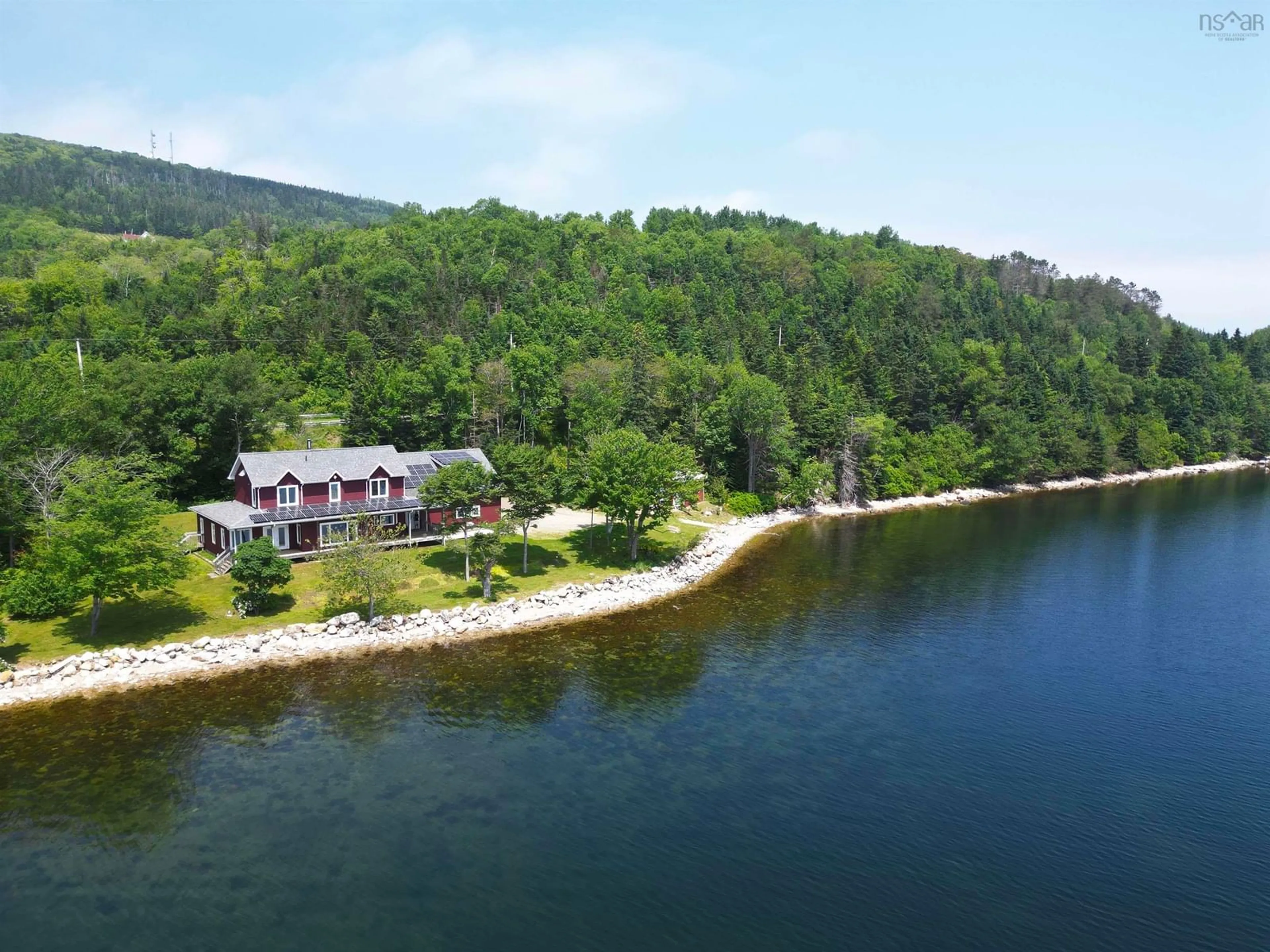 A pic from outside/outdoor area/front of a property/back of a property/a pic from drone, water/lake/river/ocean view for 5276 Marble Mountain Rd., Marble Mountain Nova Scotia B0E 3K0