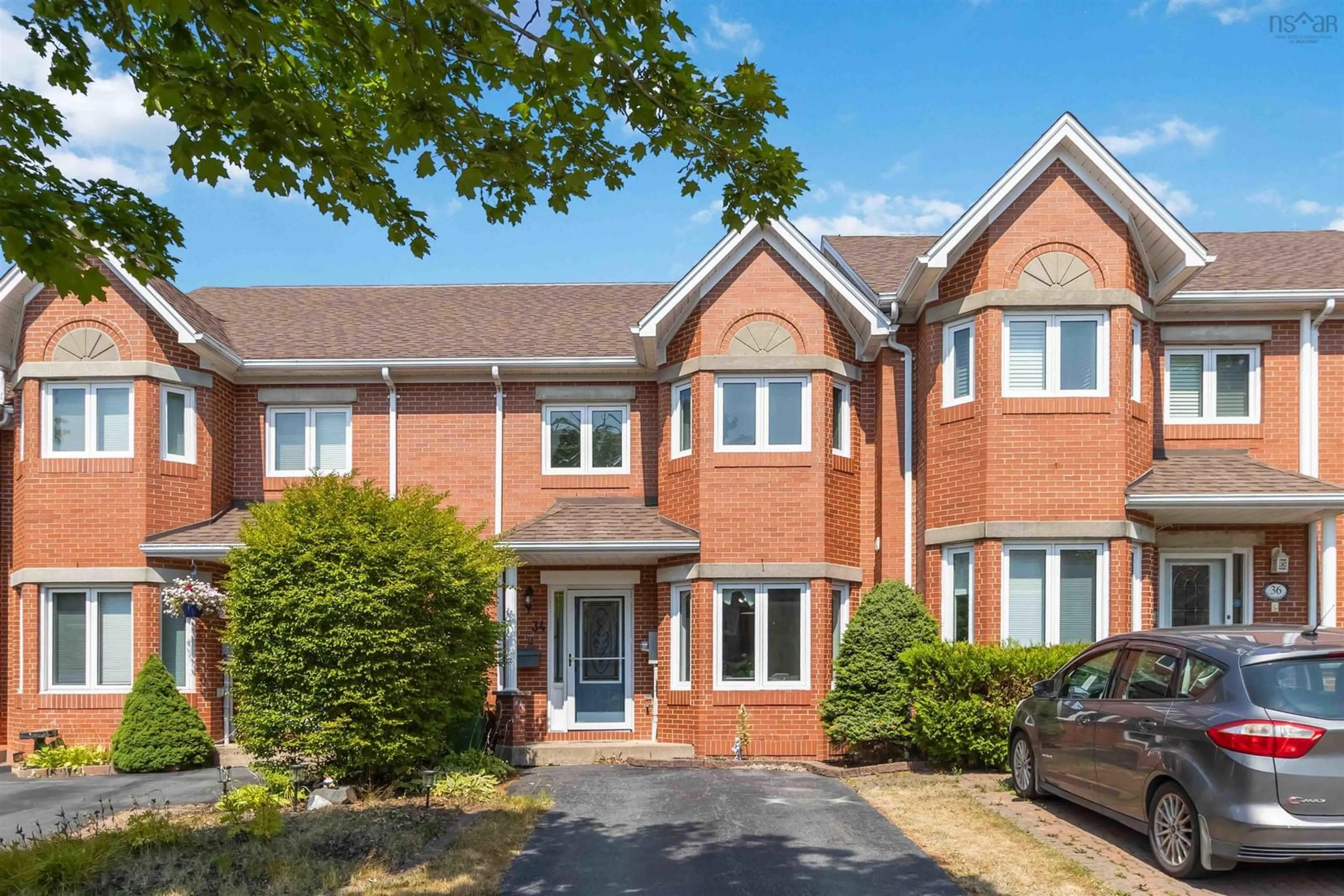 Home with brick exterior material, street for 34 Trailwood Pl, Halifax Nova Scotia B3M 3Y1