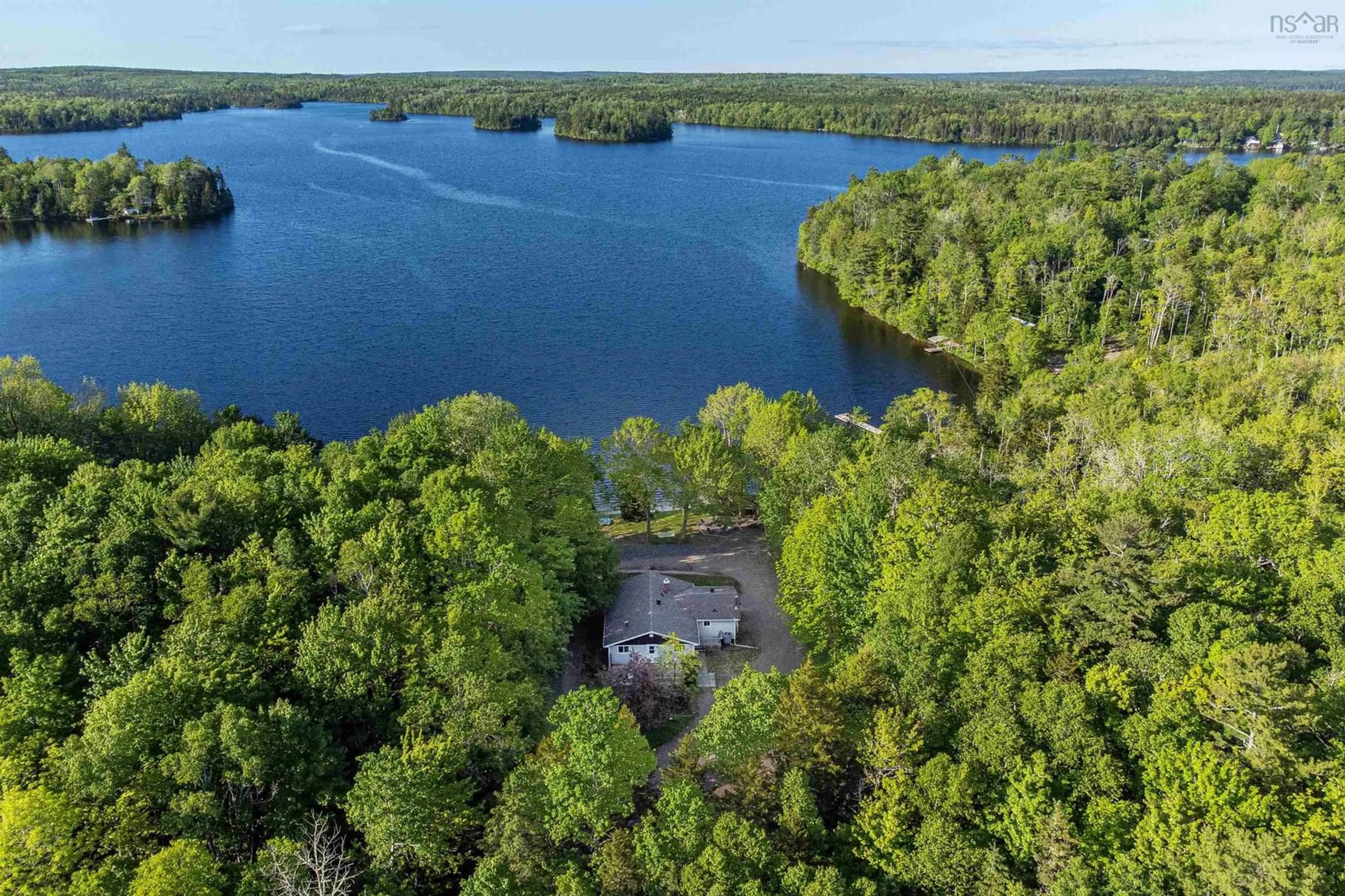 A pic from outside/outdoor area/front of a property/back of a property/a pic from drone, water/lake/river/ocean view for 4780 Aylesford Rd, Lake George Nova Scotia B0P 1C0