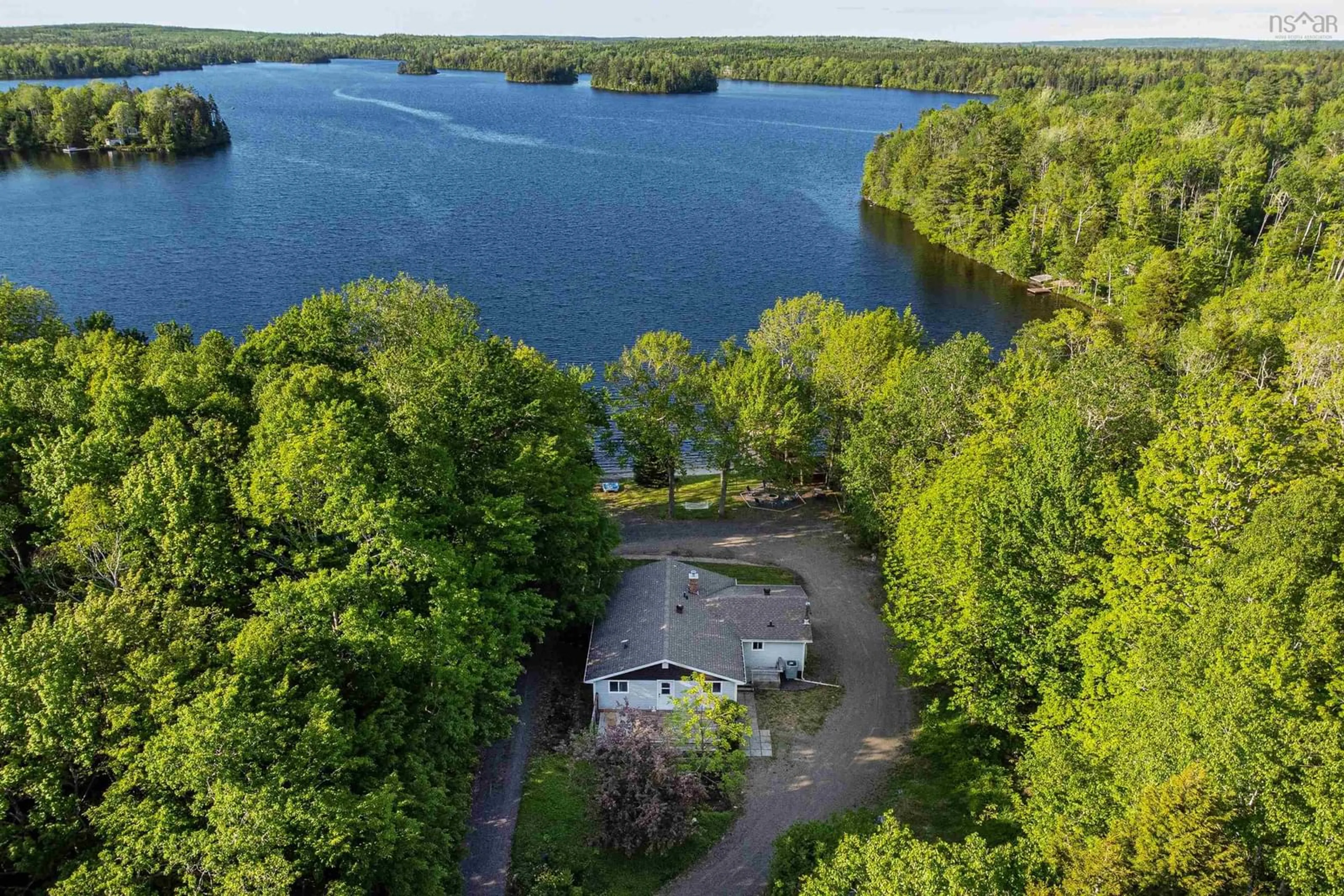 A pic from outside/outdoor area/front of a property/back of a property/a pic from drone, water/lake/river/ocean view for 4780 Aylesford Rd, Lake George Nova Scotia B0P 1C0