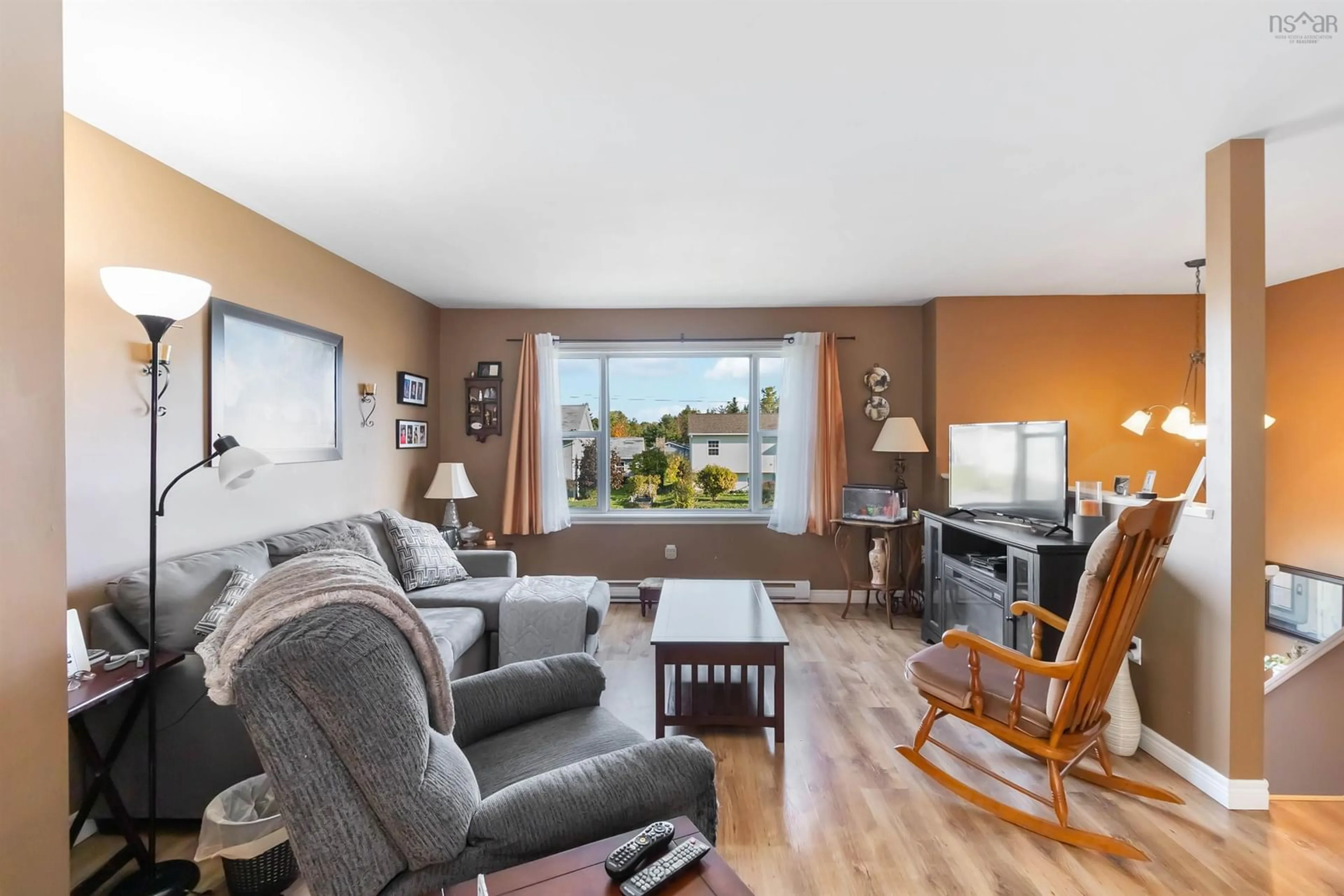 Living room with furniture, wood/laminate floor for 45 Grove Ave, Beaver Bank Nova Scotia B4G 1B7