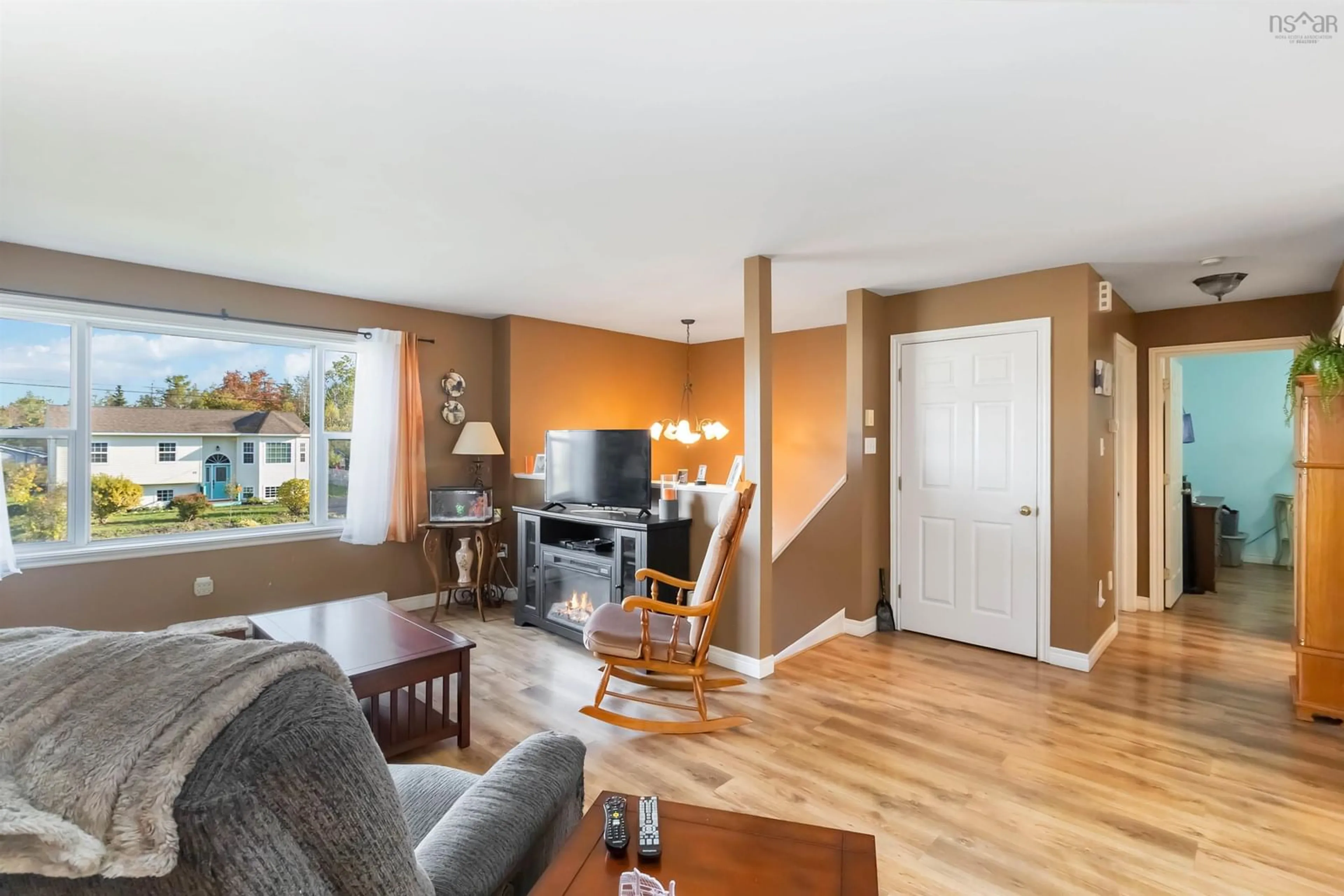 Living room with furniture, wood/laminate floor for 45 Grove Ave, Beaver Bank Nova Scotia B4G 1B7