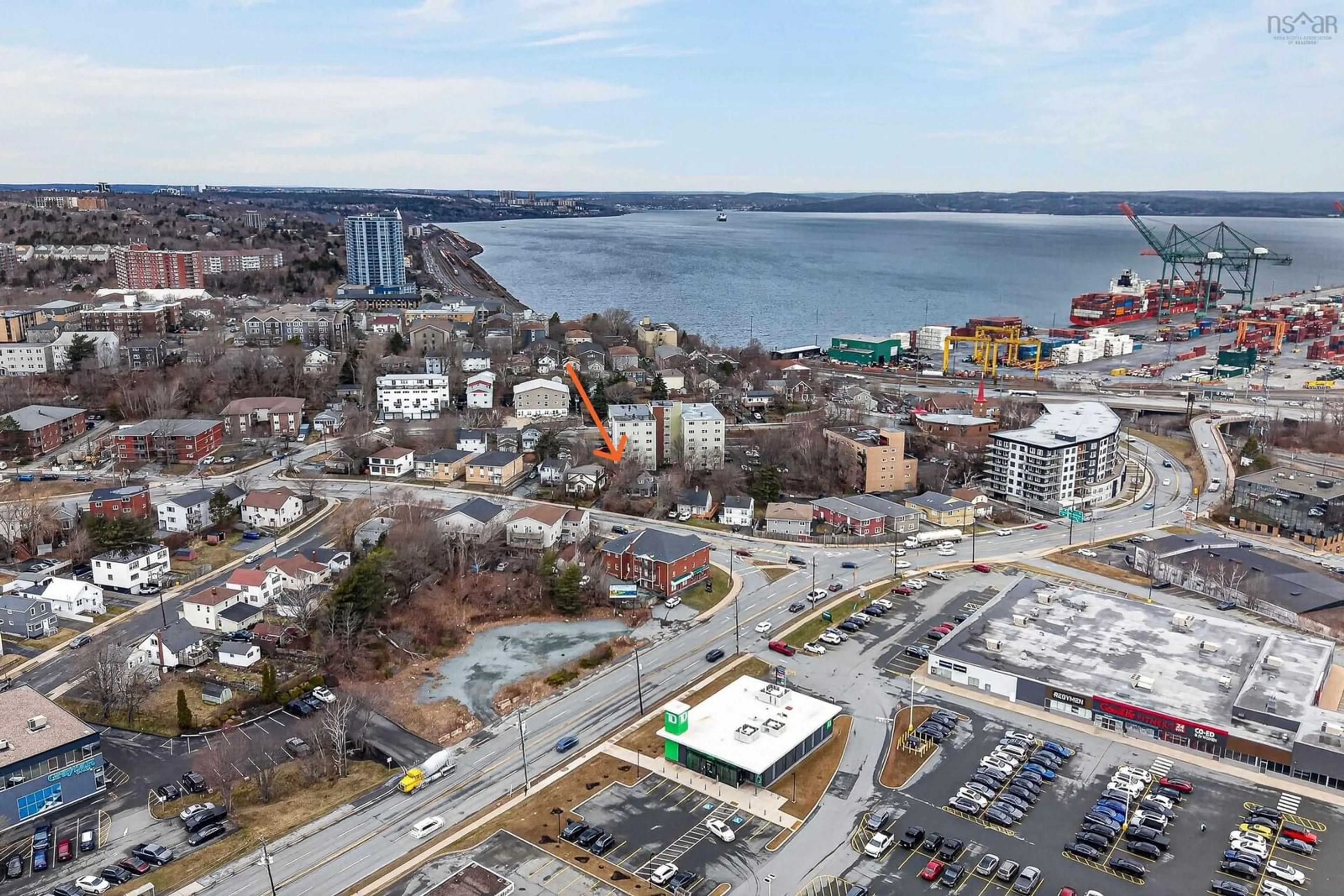 A pic from outside/outdoor area/front of a property/back of a property/a pic from drone, water/lake/river/ocean view for 3762 Dutch Village Rd, Halifax Nova Scotia B3N 2S5