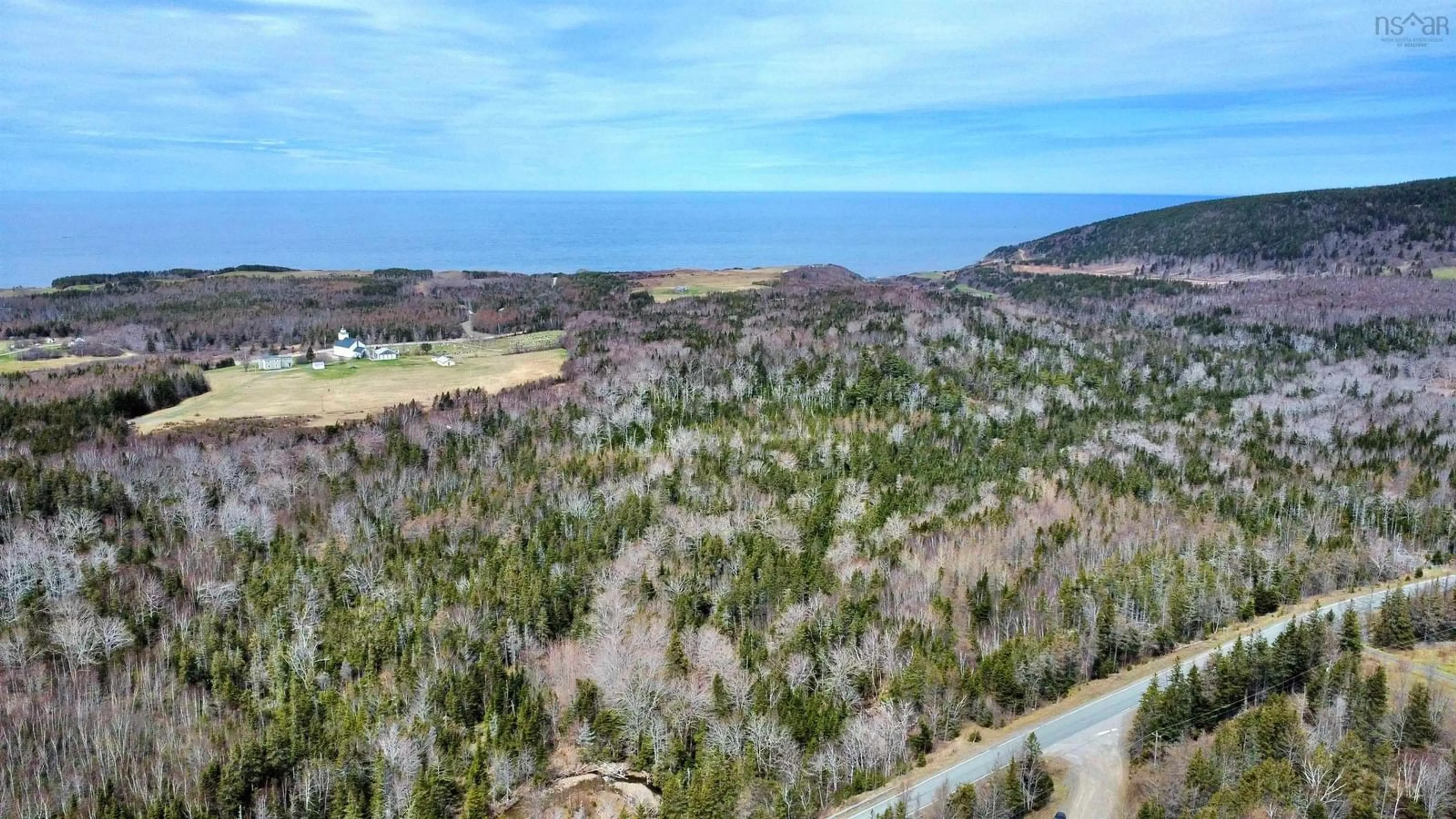 A pic from outside/outdoor area/front of a property/back of a property/a pic from drone, water/lake/river/ocean view for 258 Broad Cove Marsh Rd, Inverness County Nova Scotia B0E 1N0