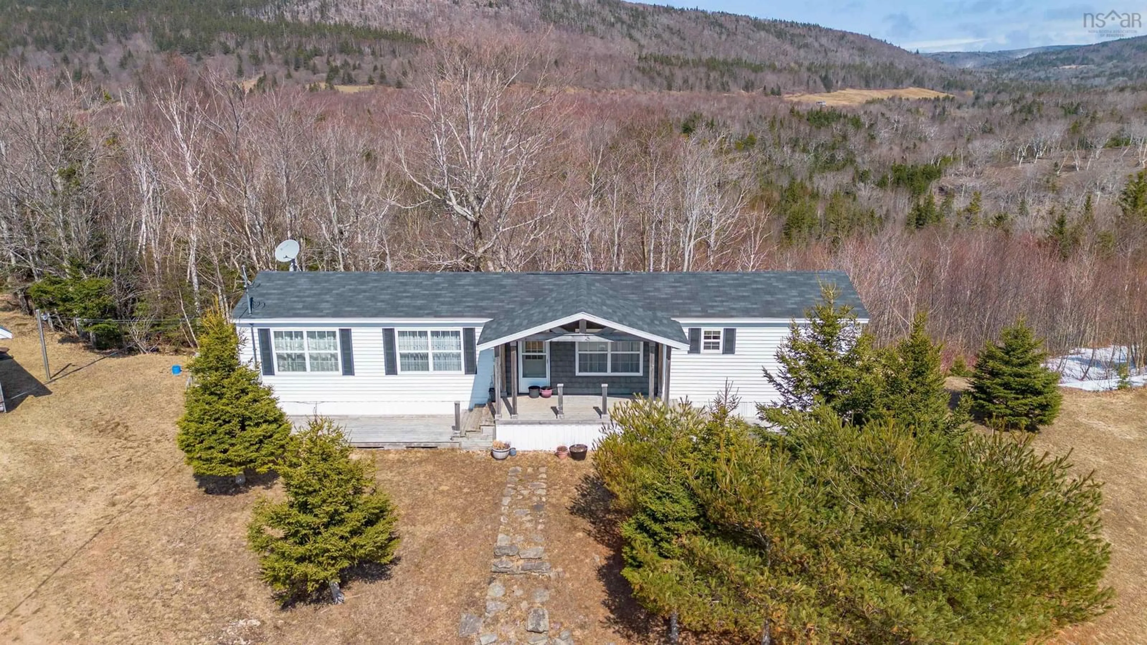 A pic from outside/outdoor area/front of a property/back of a property/a pic from drone, water/lake/river/ocean view for 258 Broad Cove Marsh Rd, Inverness County Nova Scotia B0E 1N0