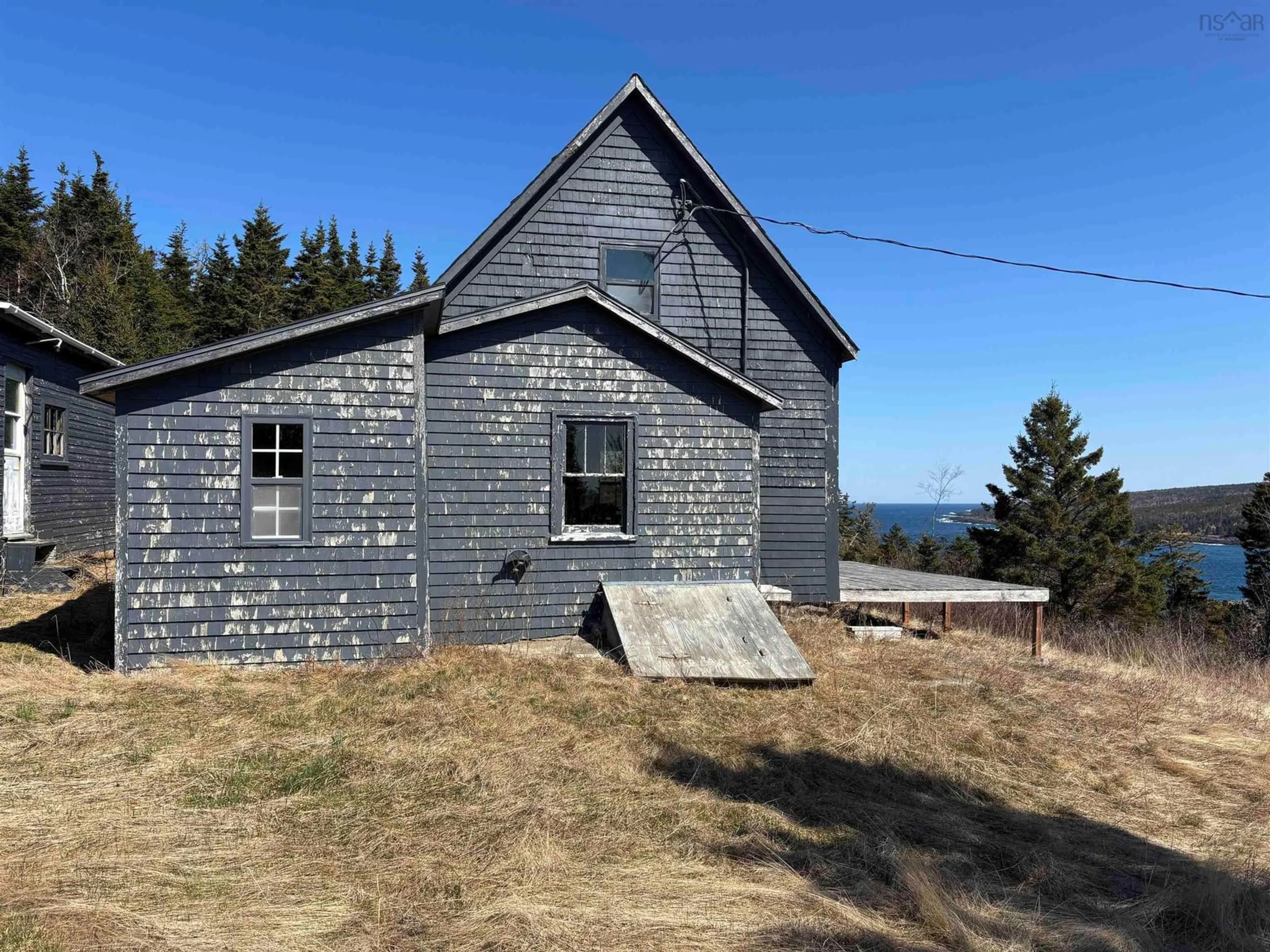 A pic from outside/outdoor area/front of a property/back of a property/a pic from drone, building for 3381 Highway 217, Tiverton Nova Scotia B0V 1G0