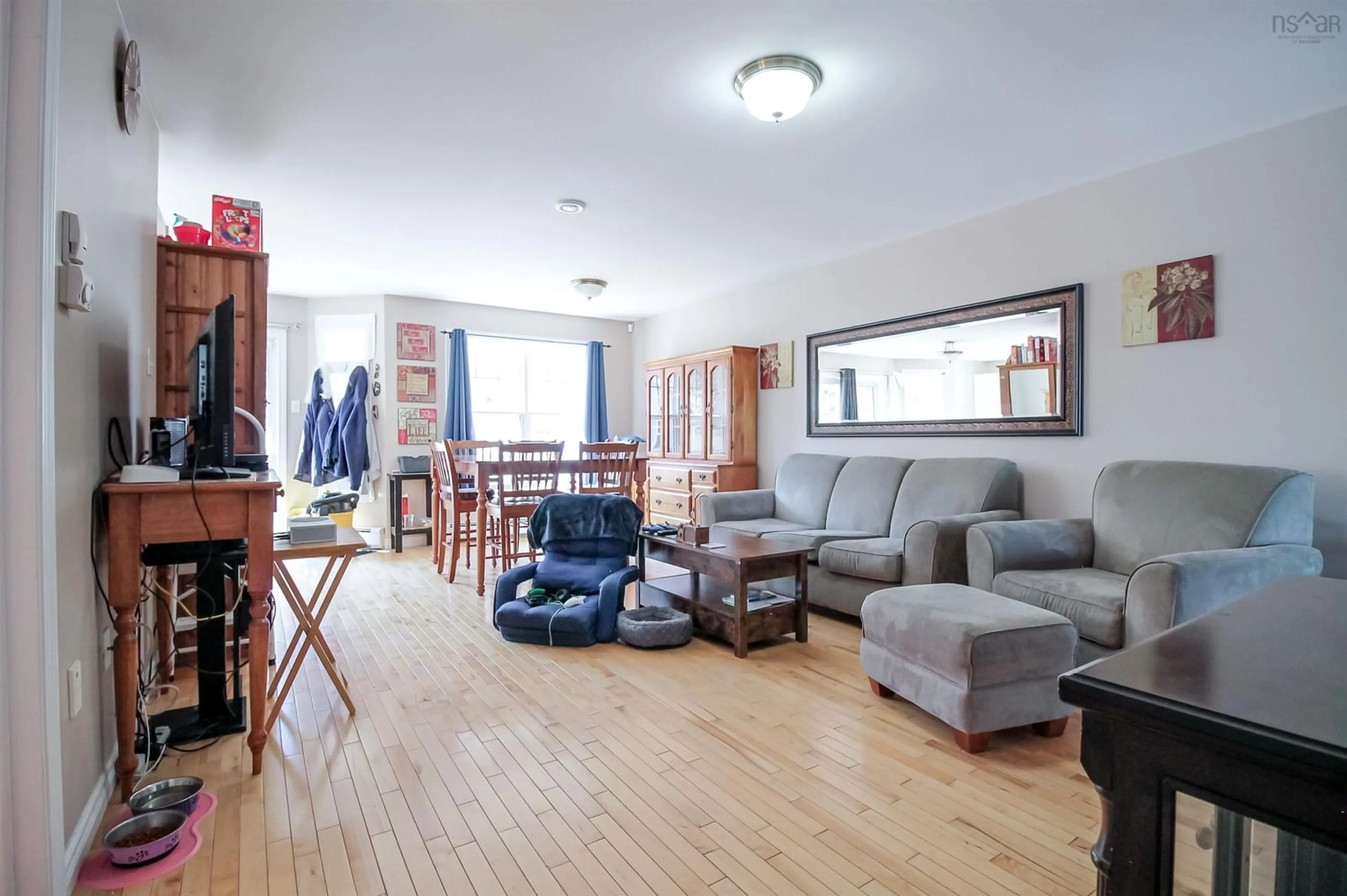 Living room with furniture, wood/laminate floor for 1014 Sackville Dr, Middle Sackville Nova Scotia B4E 1S4