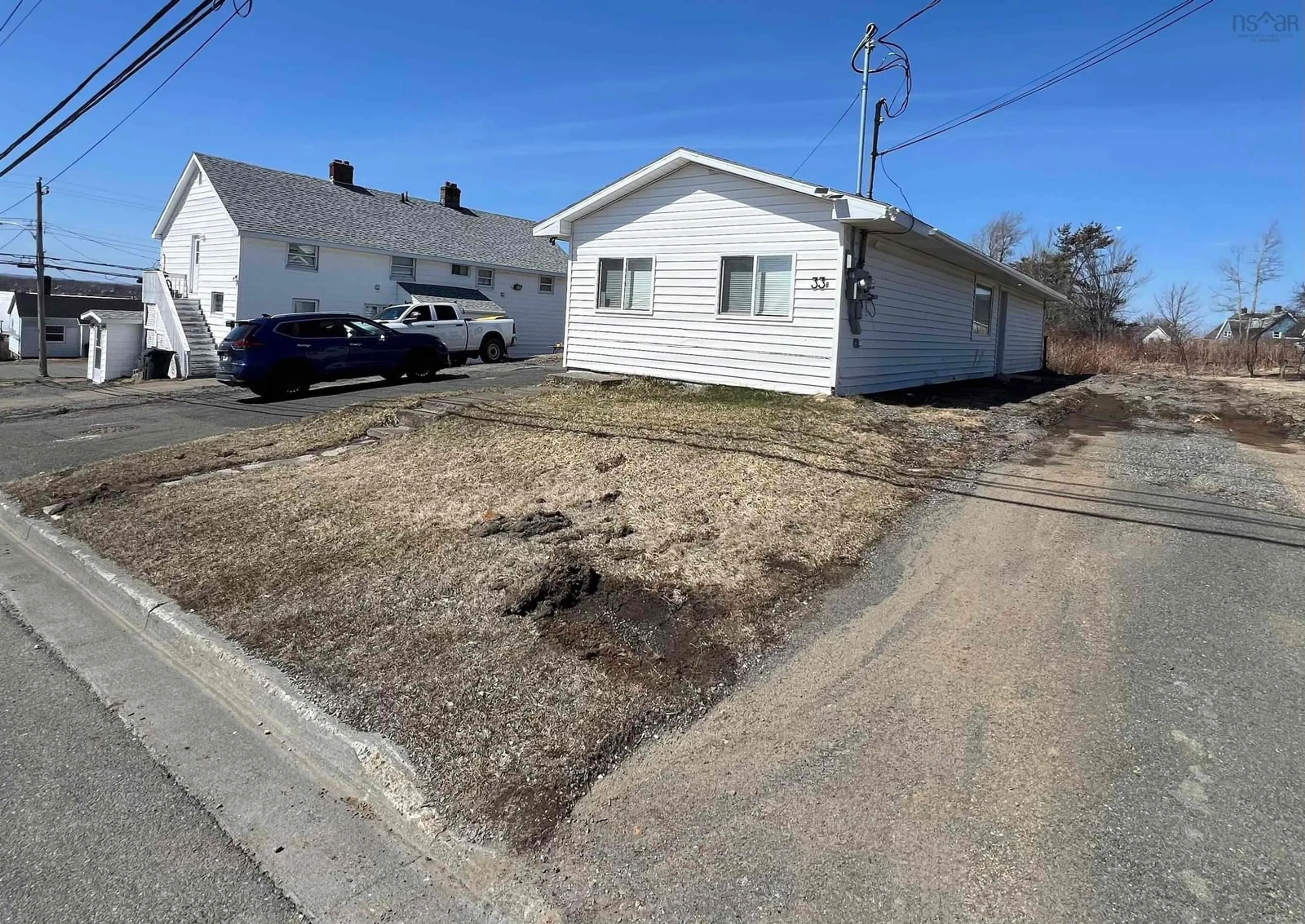 A pic from outside/outdoor area/front of a property/back of a property/a pic from drone, street for 33 Inverness St, Sydney Nova Scotia B1P 0E2