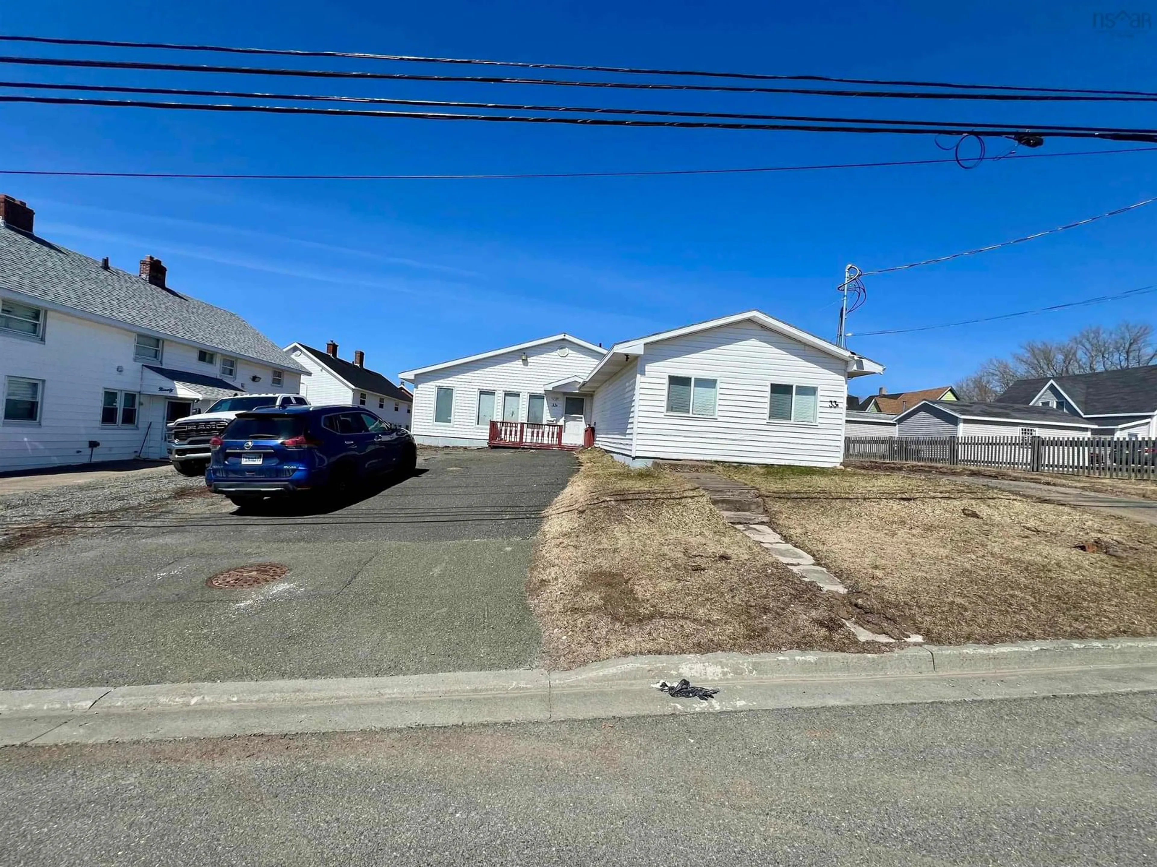 A pic from outside/outdoor area/front of a property/back of a property/a pic from drone, street for 33 Inverness St, Sydney Nova Scotia B1P 0E2