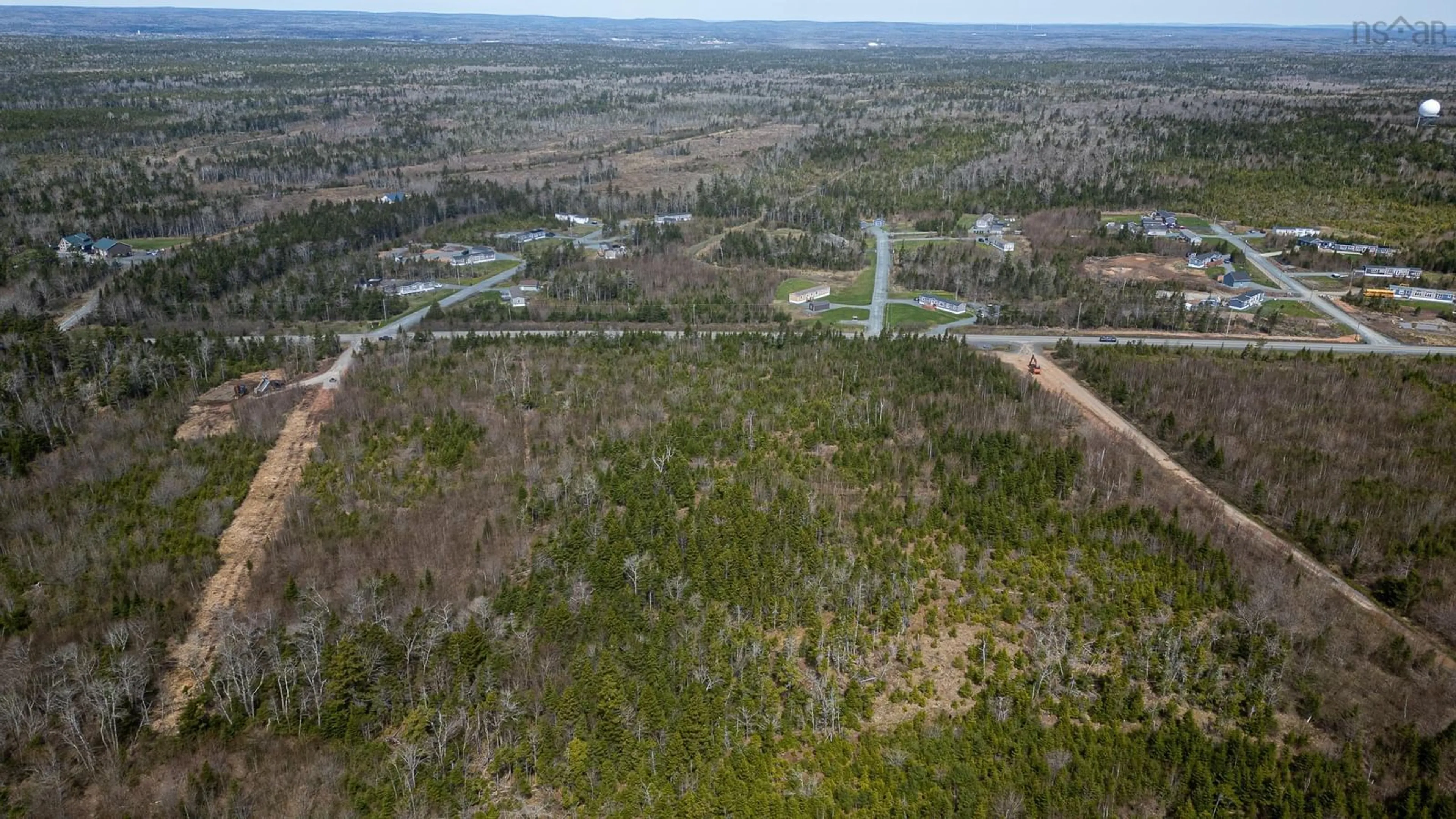 A pic from outside/outdoor area/front of a property/back of a property/a pic from drone, forest/trees view for 83 Maverick Lane, Devon Nova Scotia B3T 1X4