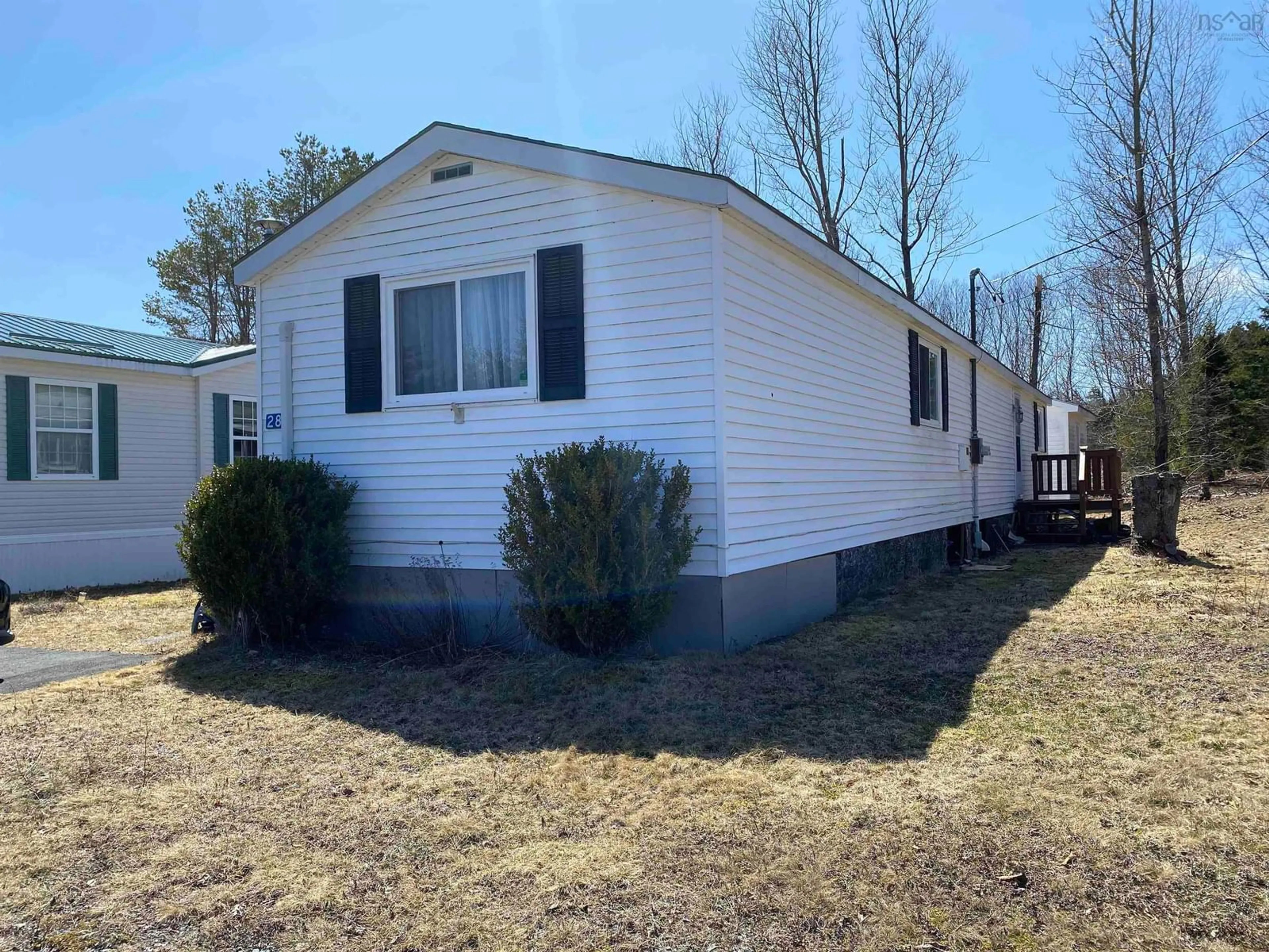Home with vinyl exterior material, street for 28 Christina Dr, White Point Nova Scotia B0T 1G0