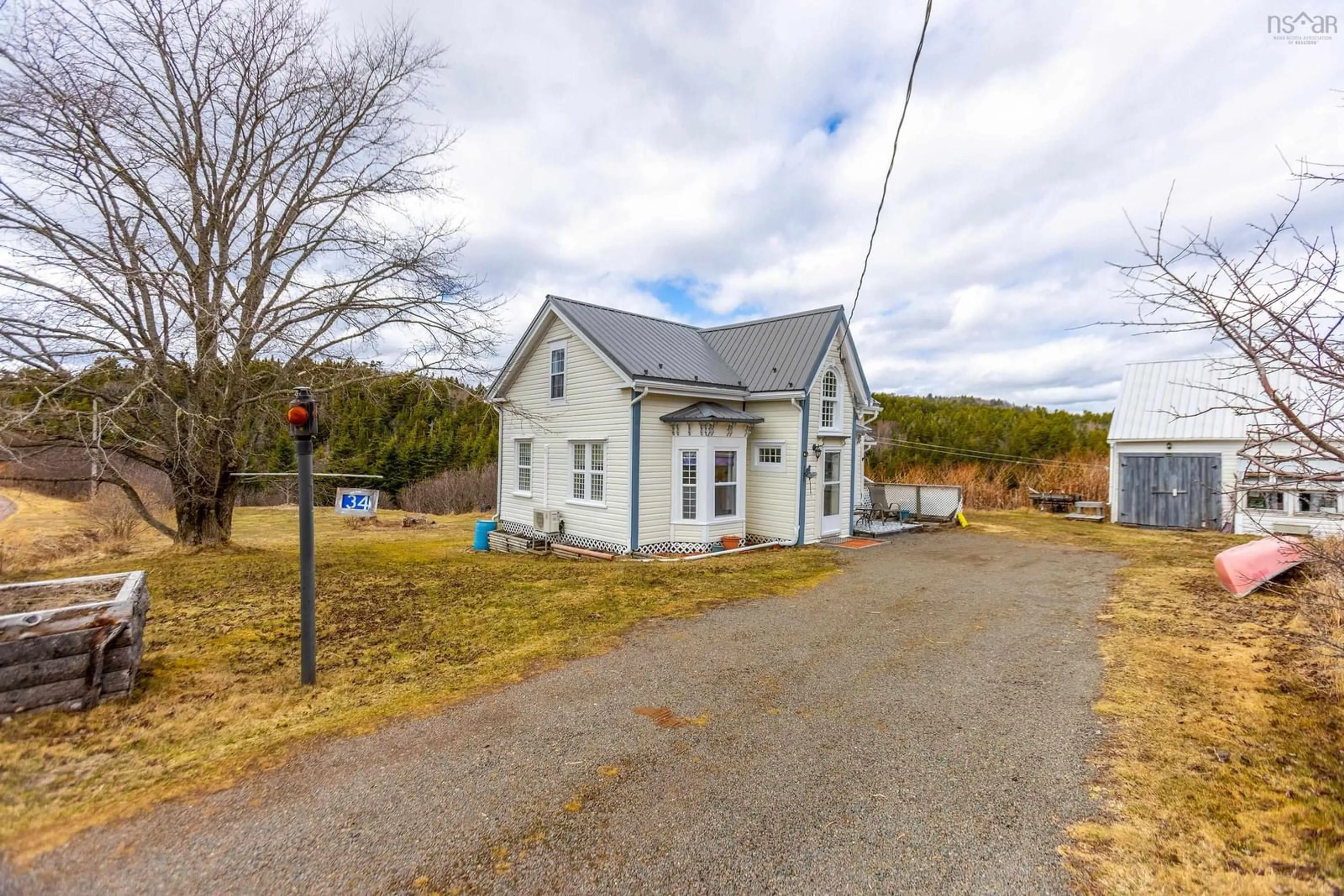 A pic from outside/outdoor area/front of a property/back of a property/a pic from drone, street for 34 Ratchford Rd, Port Greville Nova Scotia B0M 1S0