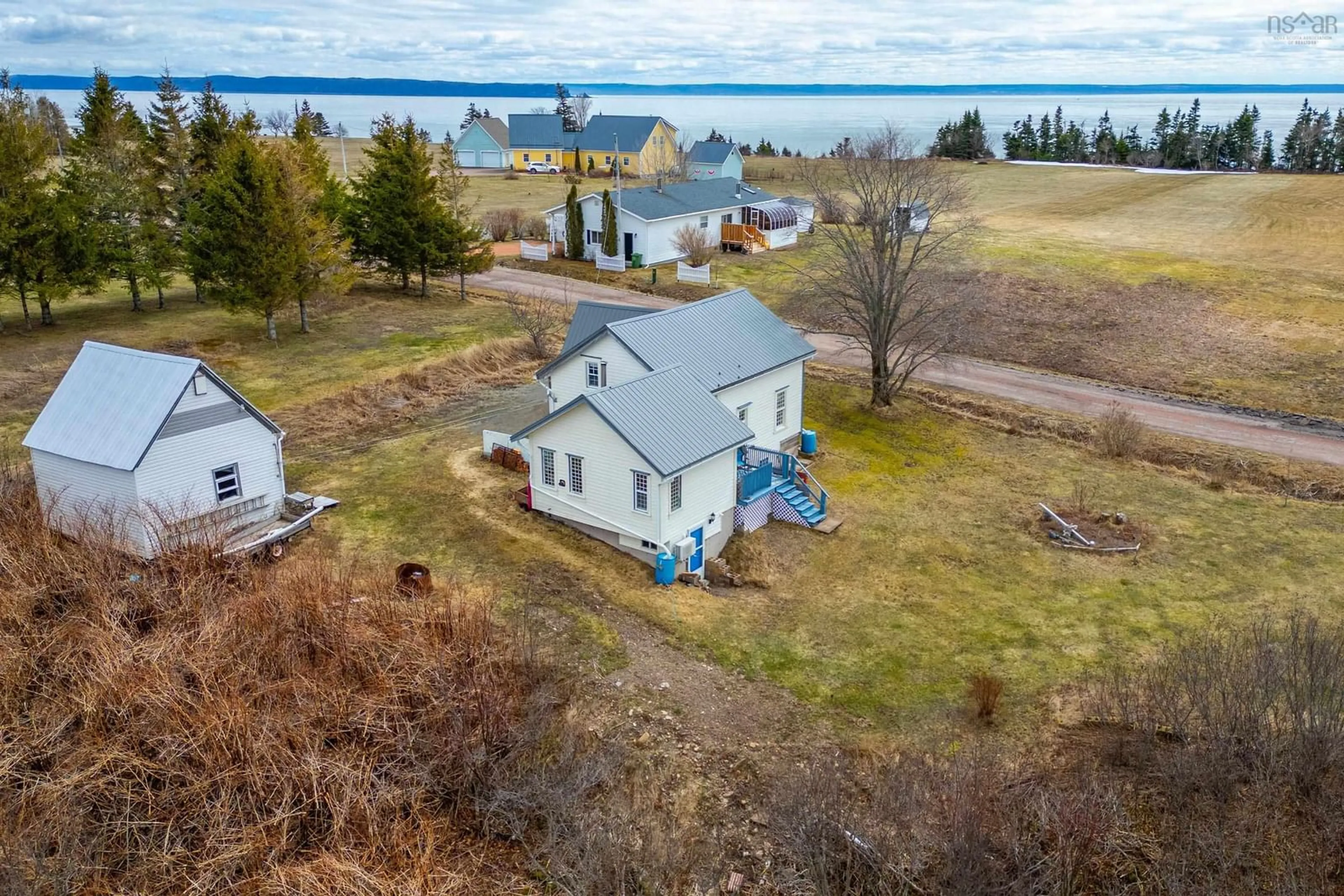 A pic from outside/outdoor area/front of a property/back of a property/a pic from drone, water/lake/river/ocean view for 34 Ratchford Rd, Port Greville Nova Scotia B0M 1S0