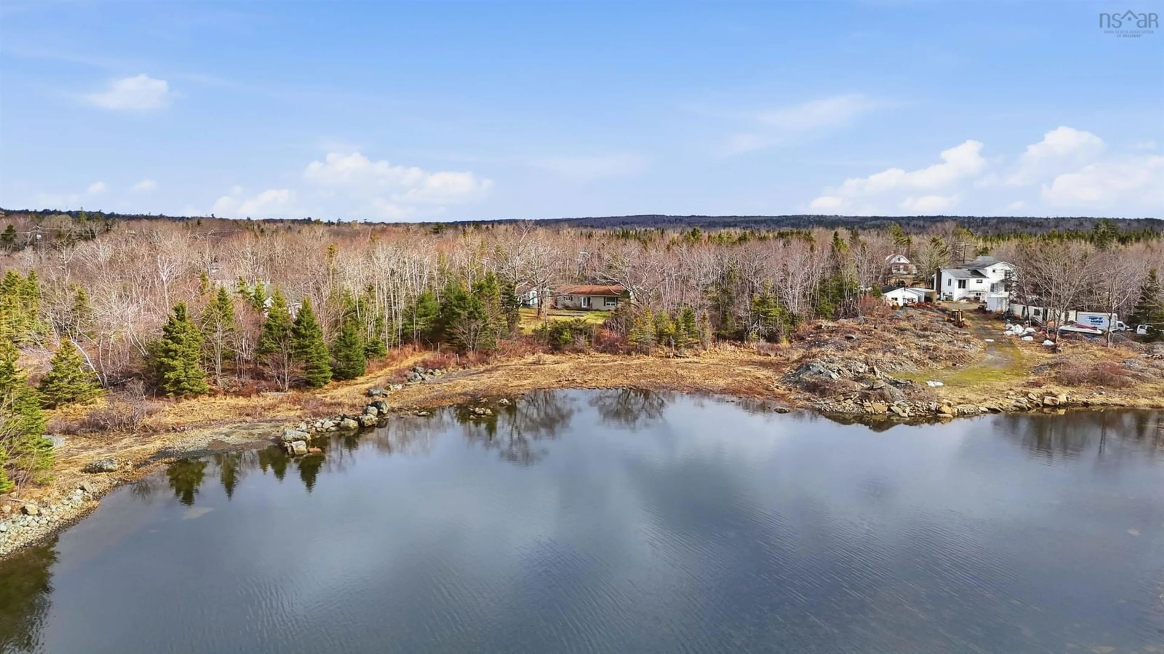 A pic from outside/outdoor area/front of a property/back of a property/a pic from drone, water/lake/river/ocean view for 1850 Lawrencetown Rd, Lawrencetown Nova Scotia B2Z 1C4